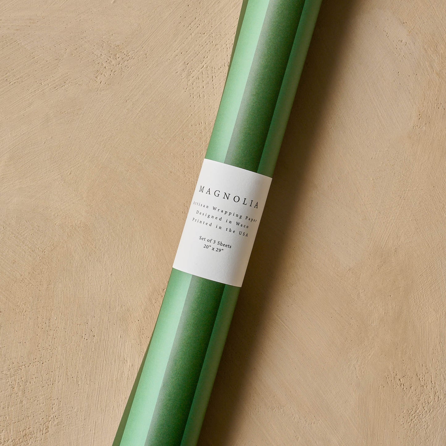 Magnolia Green Stripes Wrapping Paper Sheets wrapped into a tube