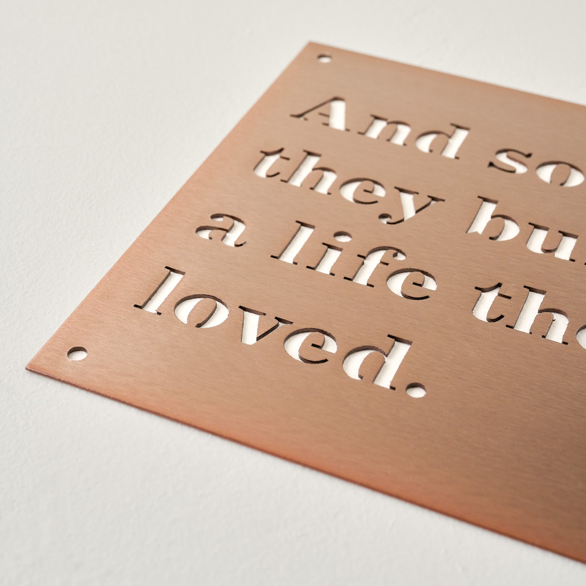 And So They Built A Life They Loved Sign sign shown up close