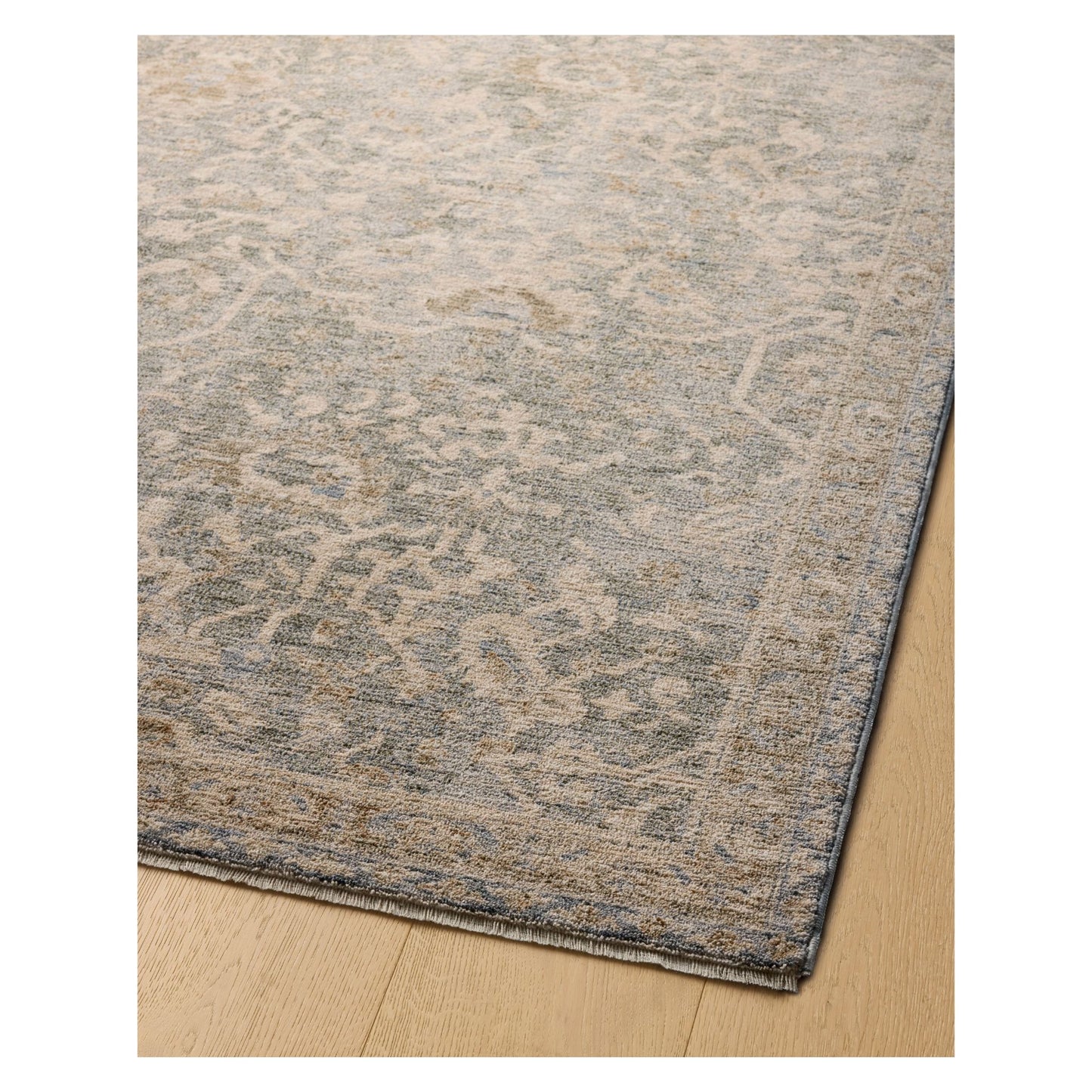 Junie Blue Natural Rug shown from a certain viewing angle