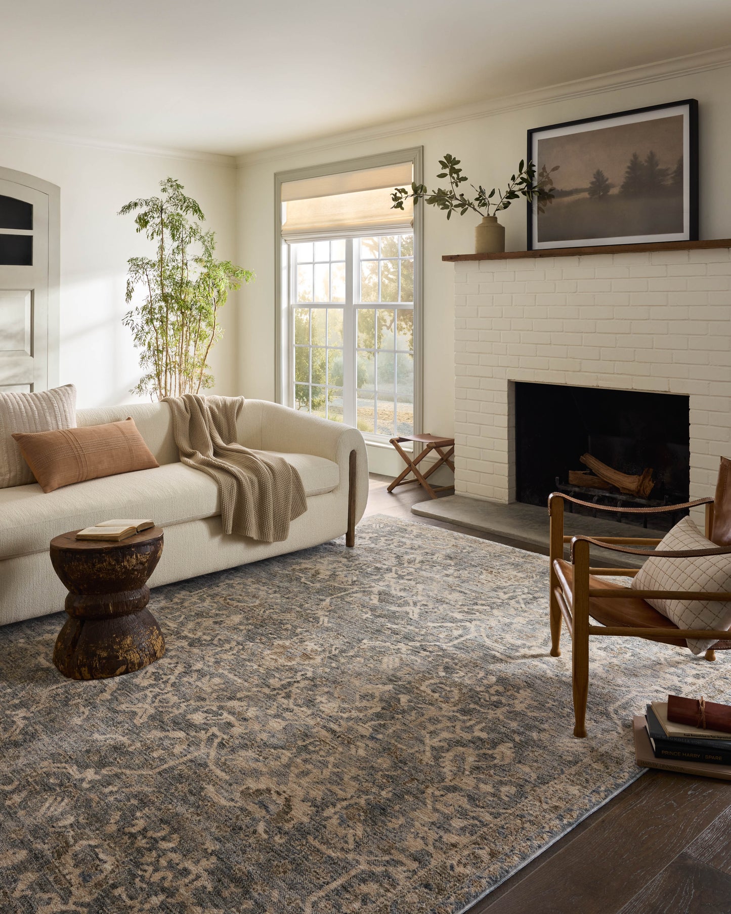 Junie Blue Natural Rug shown in bright living room
