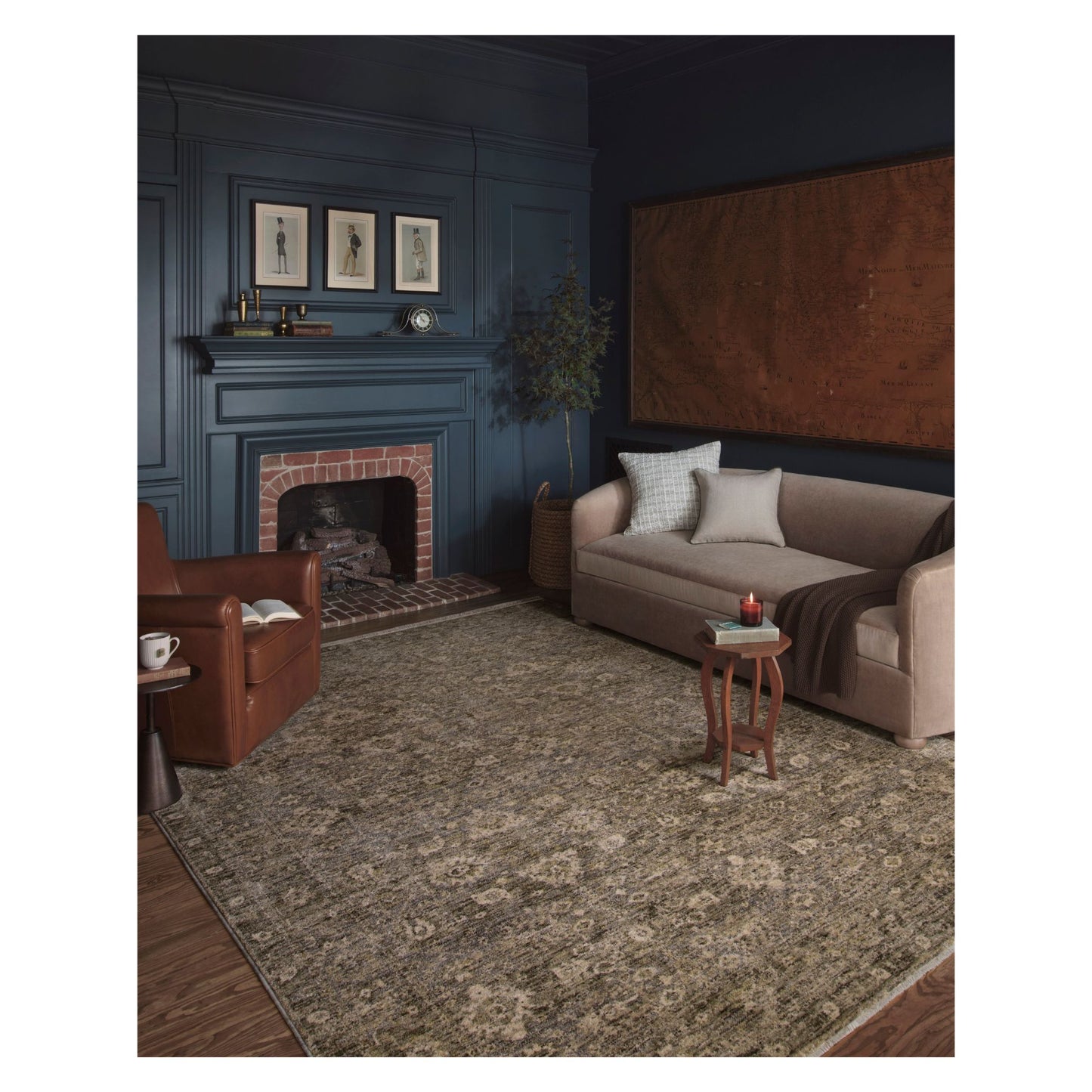 Junie Lagoon Natural Rug shown in dark and moody living room