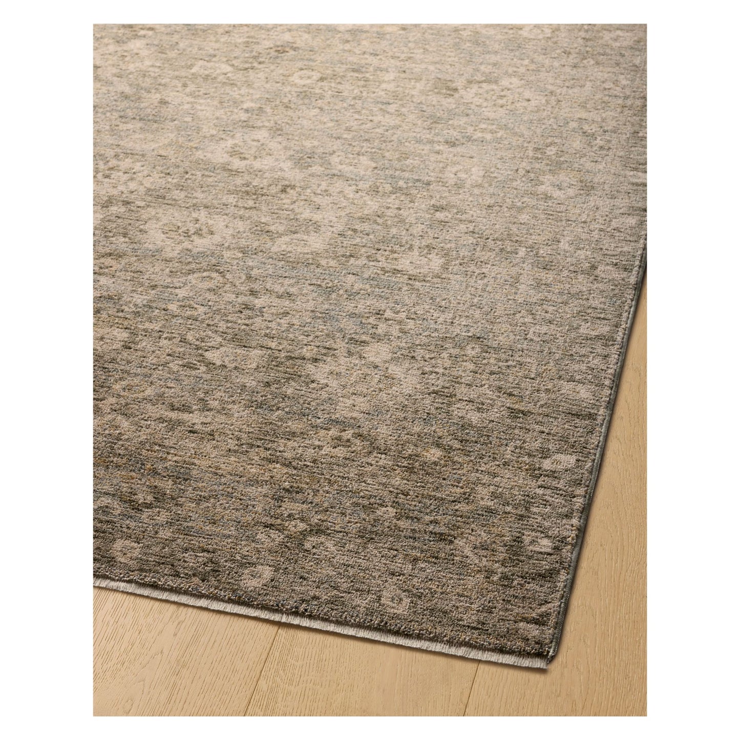 Junie Lagoon Natural Rug corner shown from a certain viewing angle