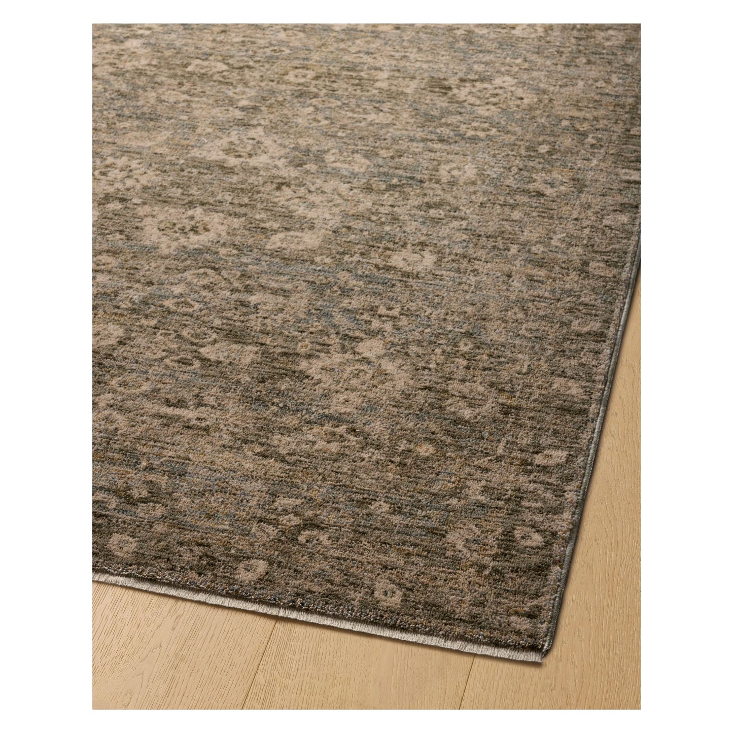 Junie Lagoon Natural Rug corner shown from a certain viewing angle