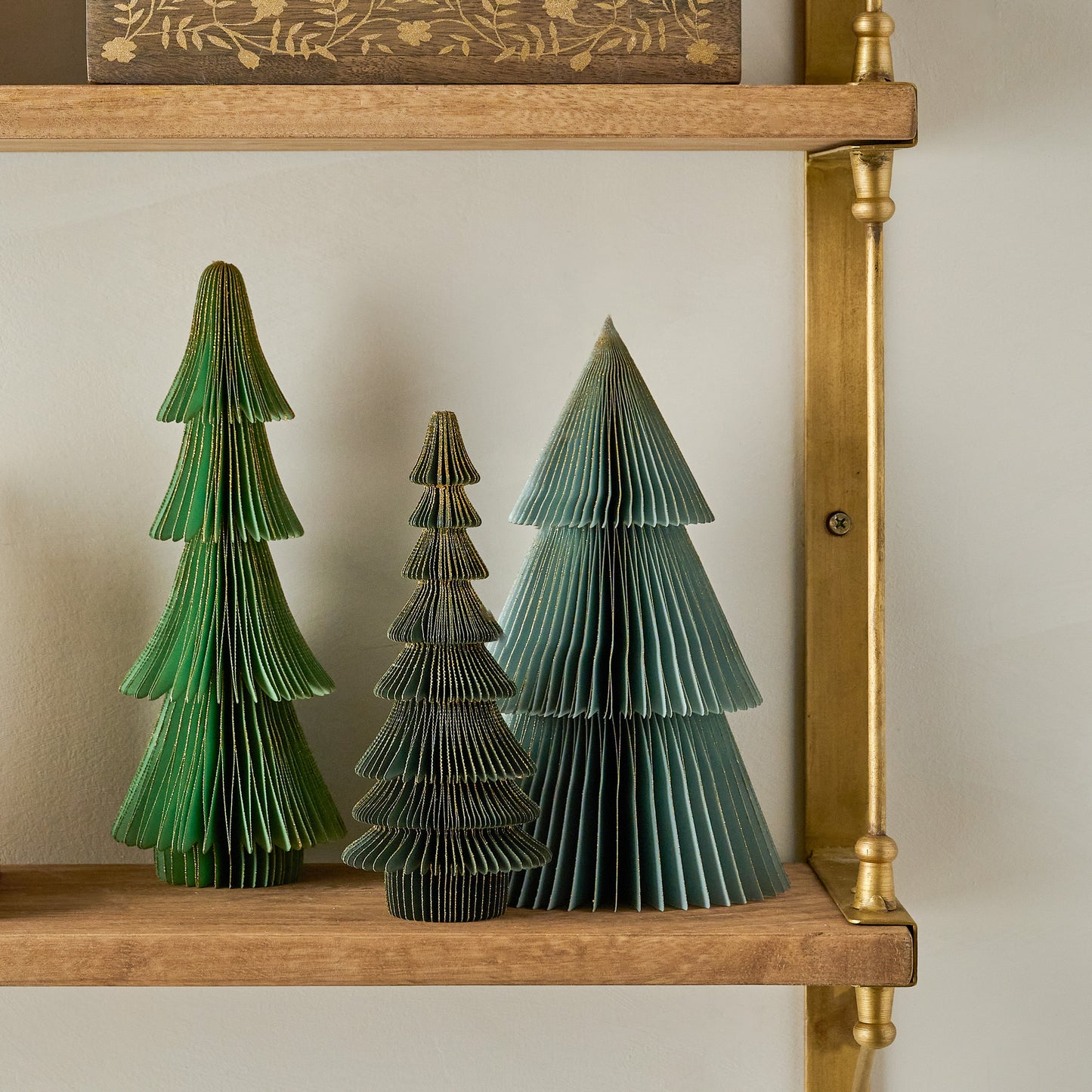 Forest Green Set of Decorative Paper Trees shown on shelf