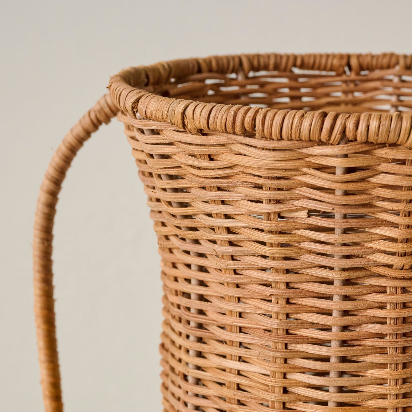 Tall Rattan Vase with Handles up close