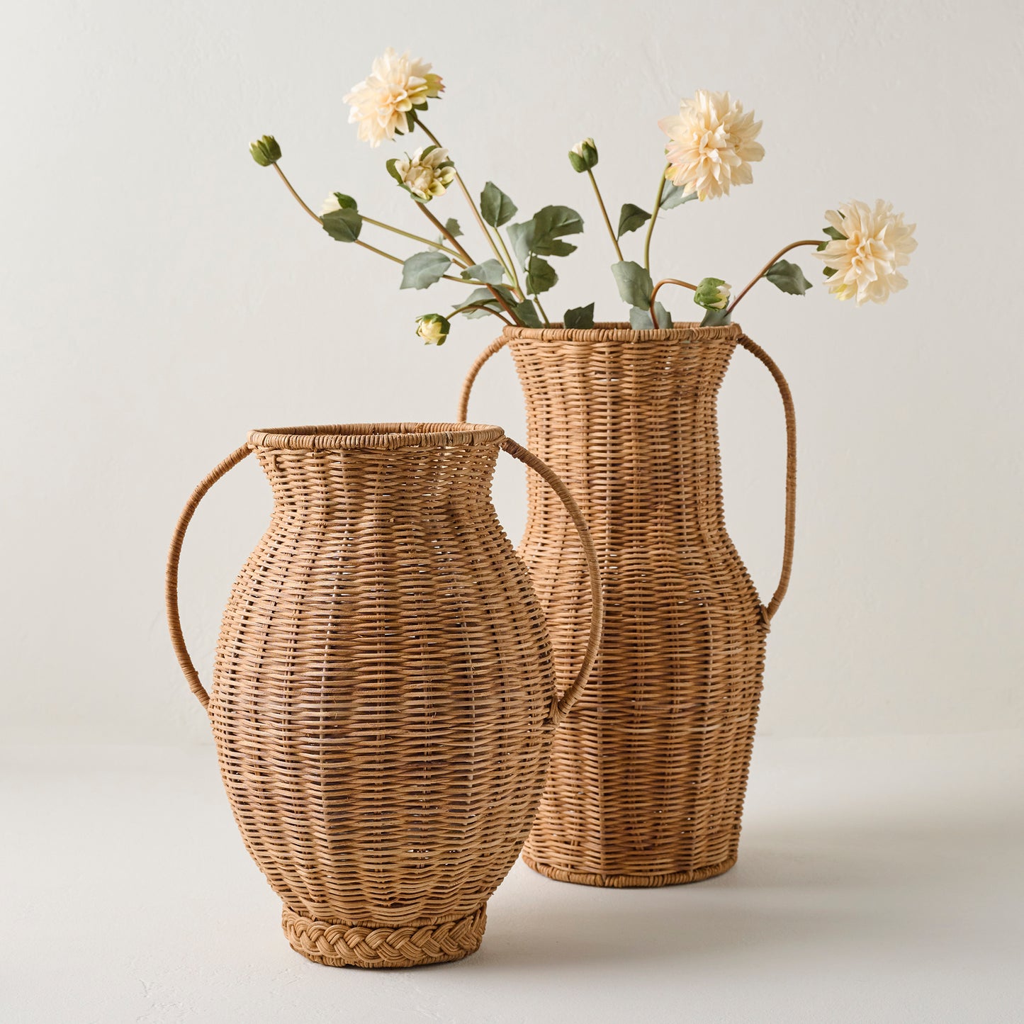 Tall Rattan Vase with Handles shown with round rattan vase