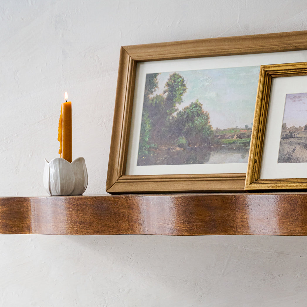 Magnolia Ceramic Taper Holder on a wall shelf