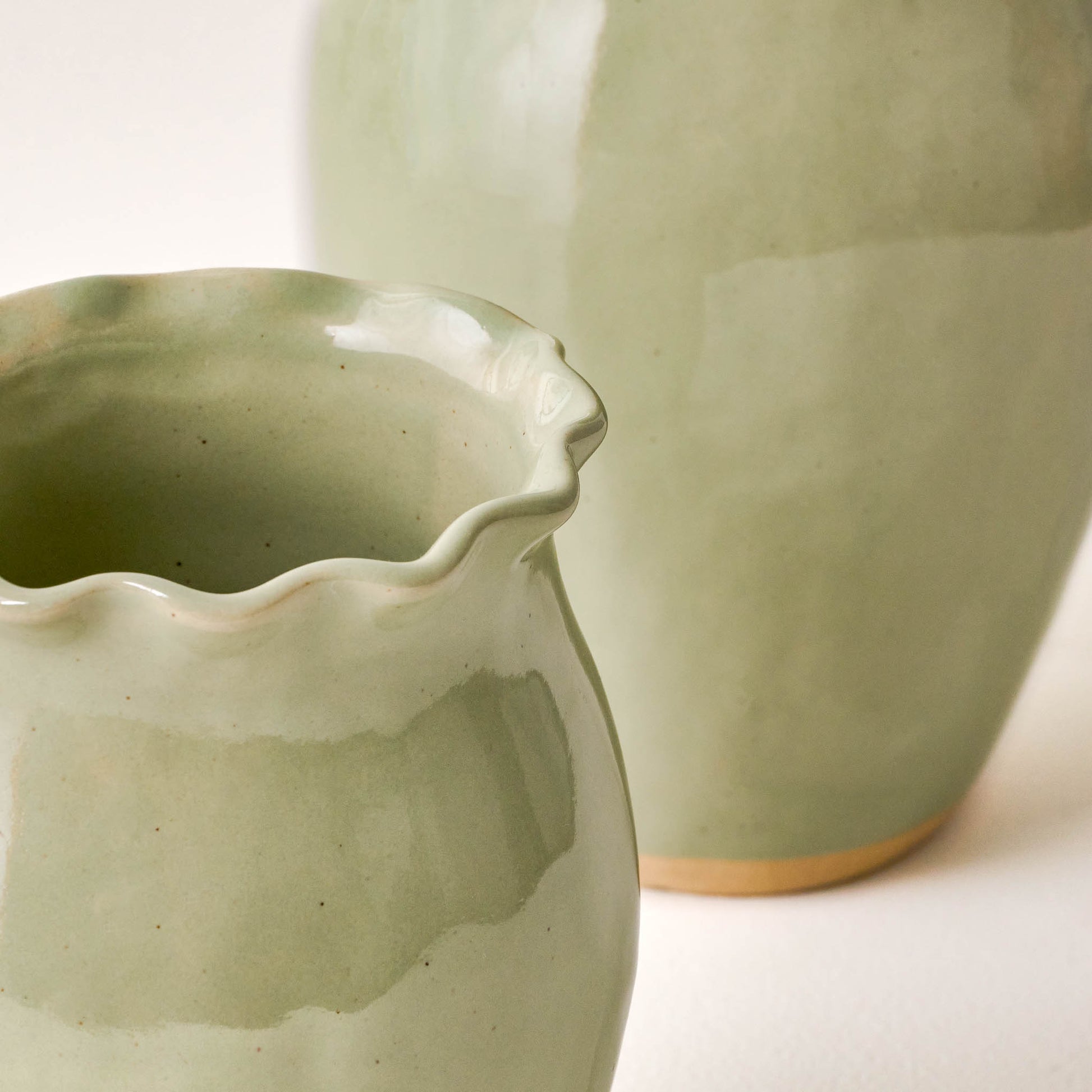 Nancy Green Scalloped Ceramic Vases close up