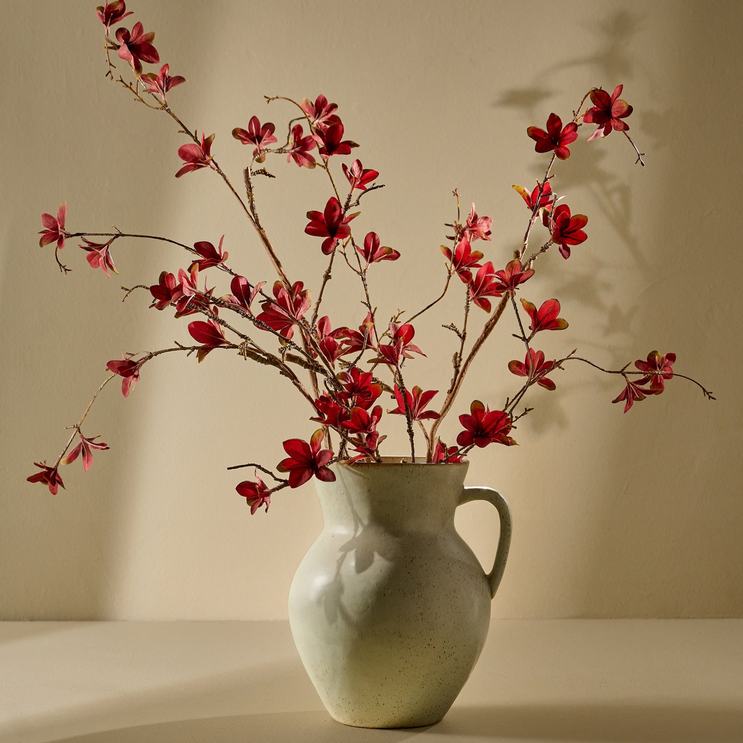 Large Rustic Green Vase holding flowers