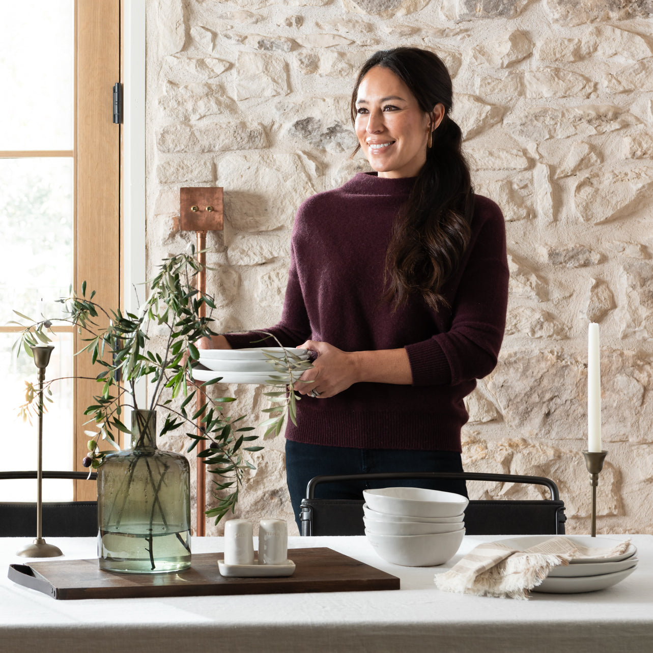 Joanna Gaines at a table