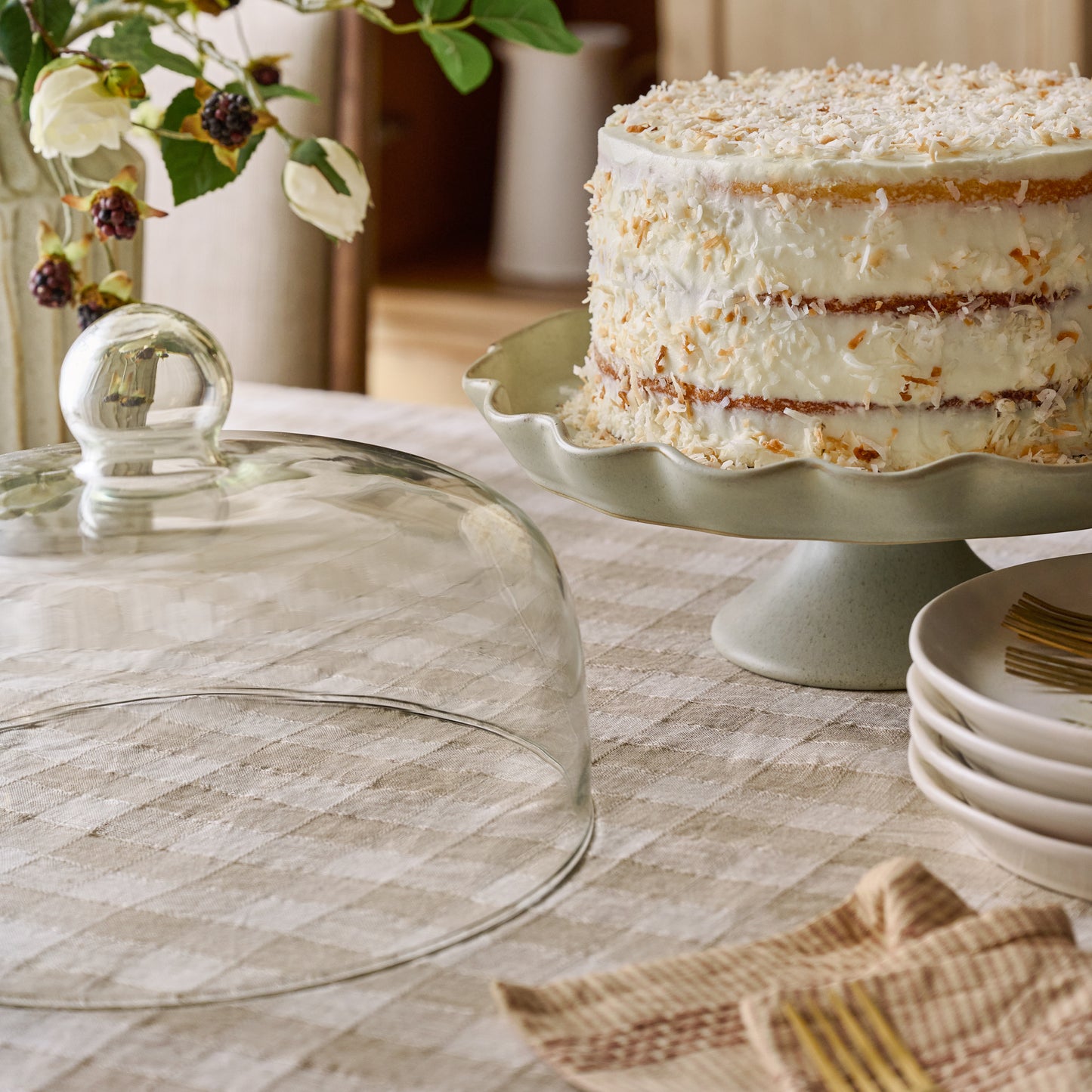 French Grey Ruffle Cake Stand with Dome - with a cake on top of stand and the dome next to cake stand