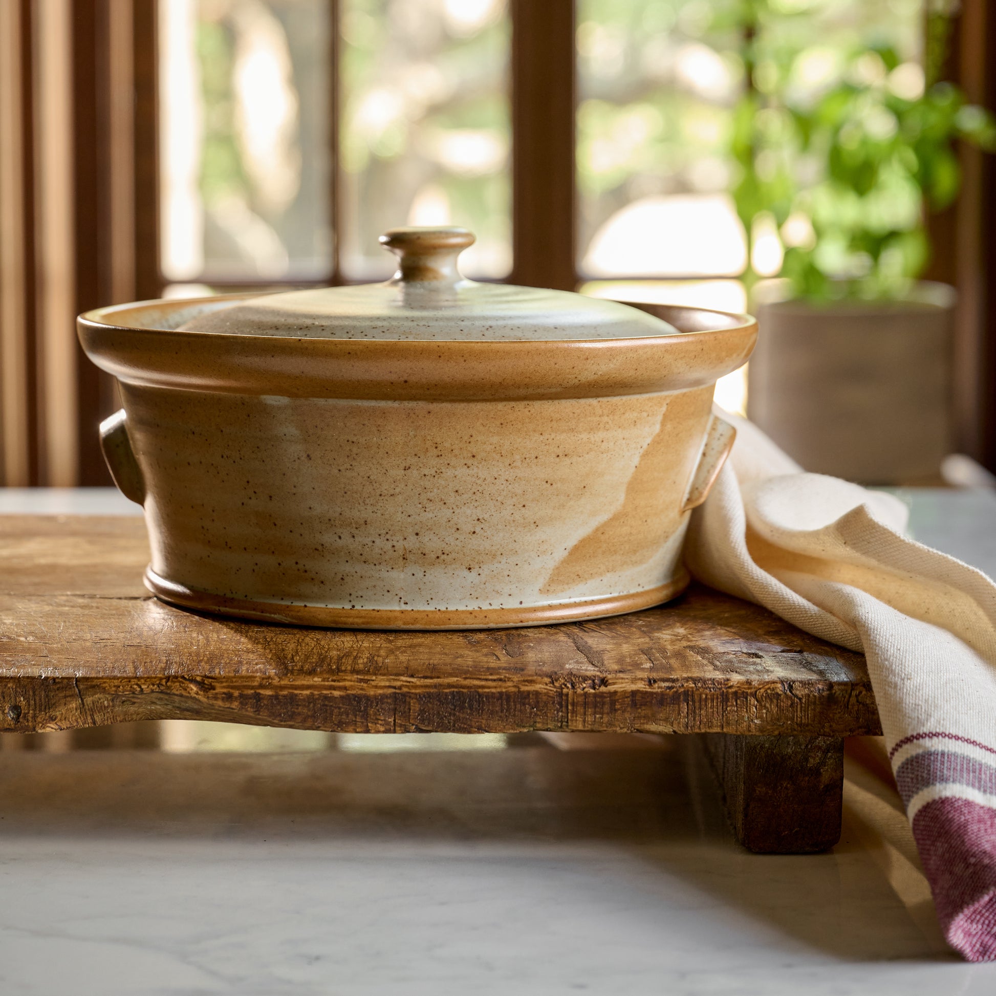 French Grey Reduction Fire Baker on a serving board