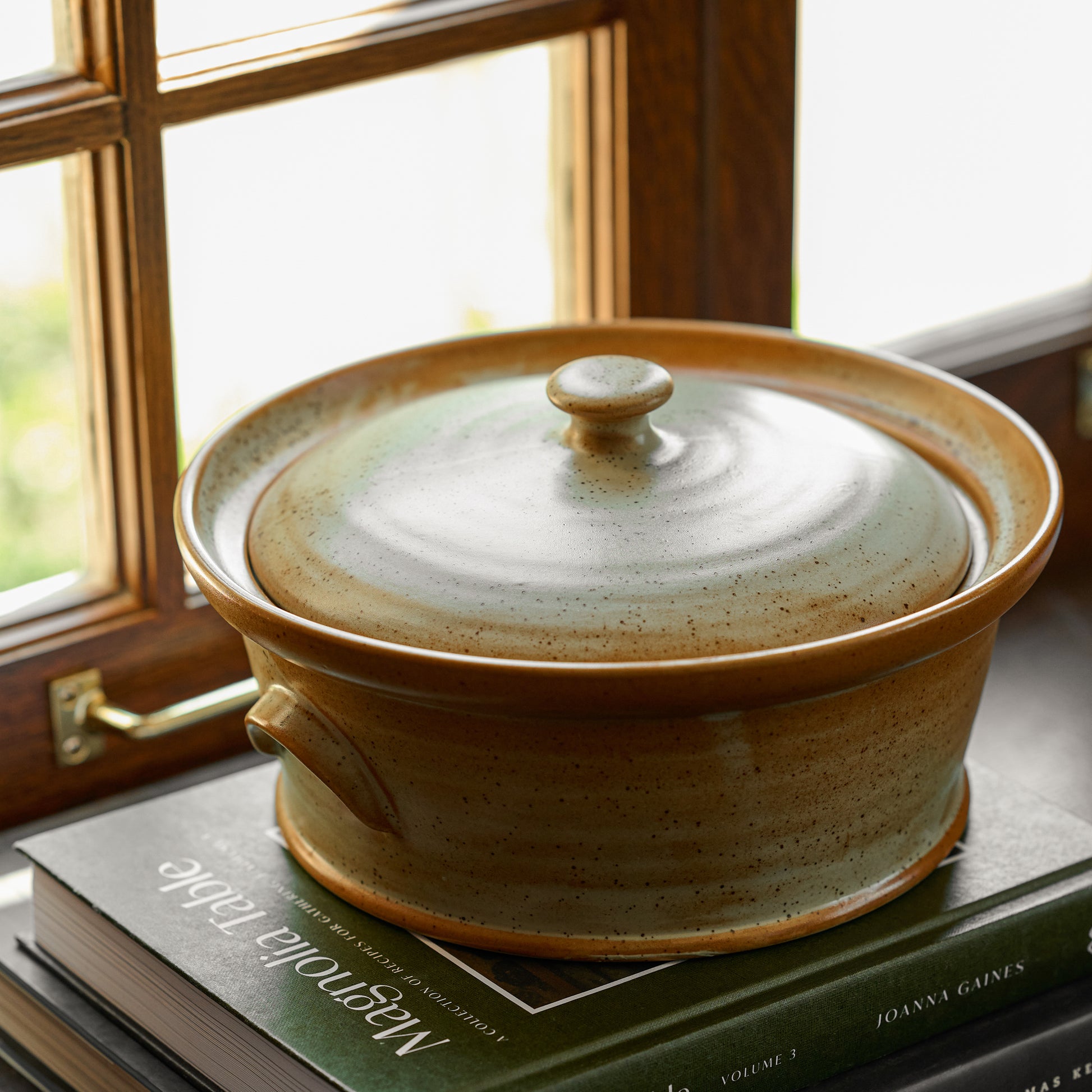 French Grey Reduction Fire Baker on top of magnolia table cookbook volume 3