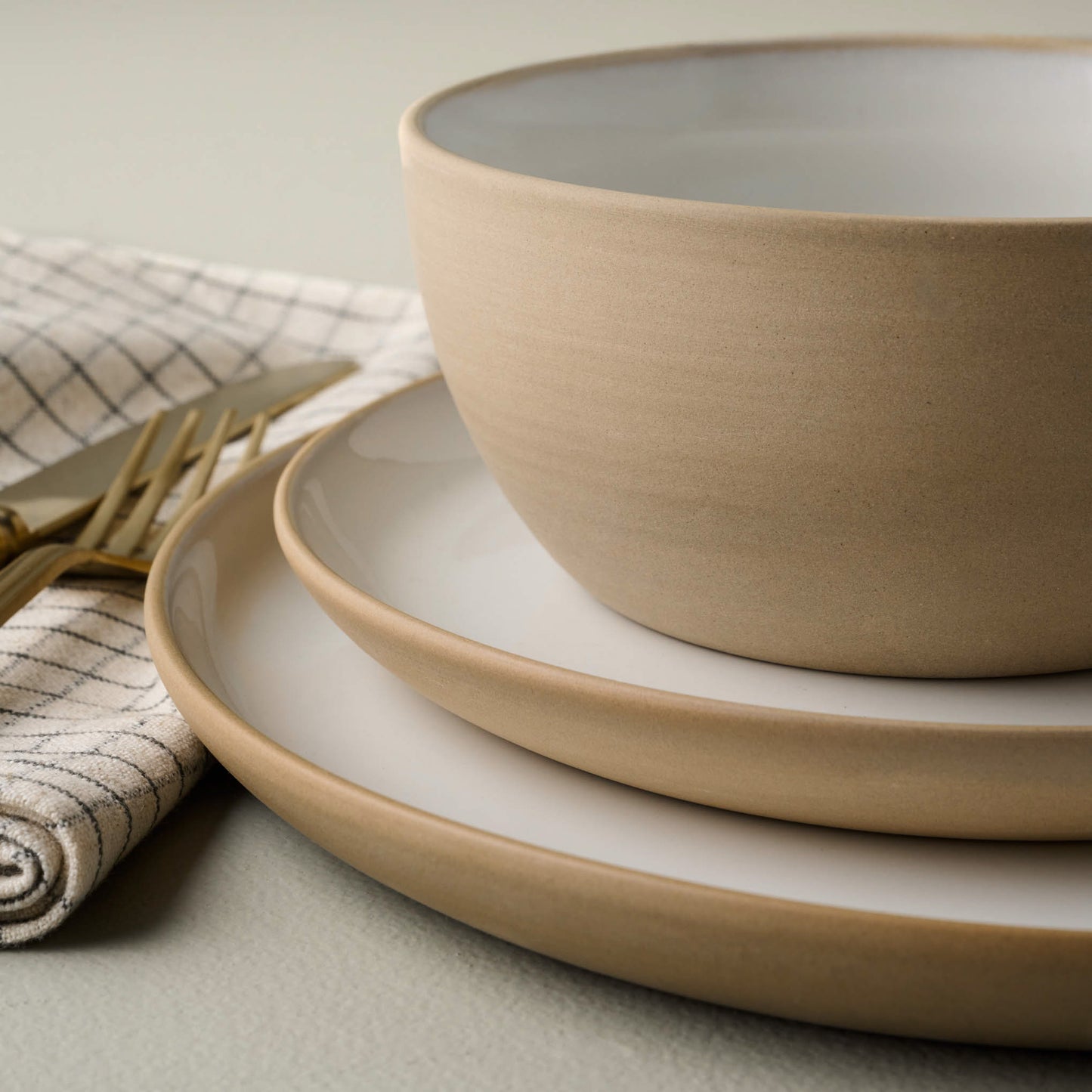 Stone White Lakelynn Plate salad plate on top of dinner plate with a bowl on top of salad plate