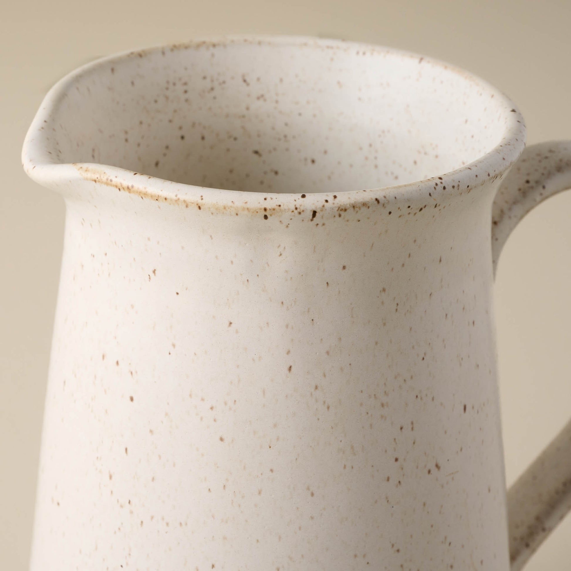 French White Speckle Pitcher close up