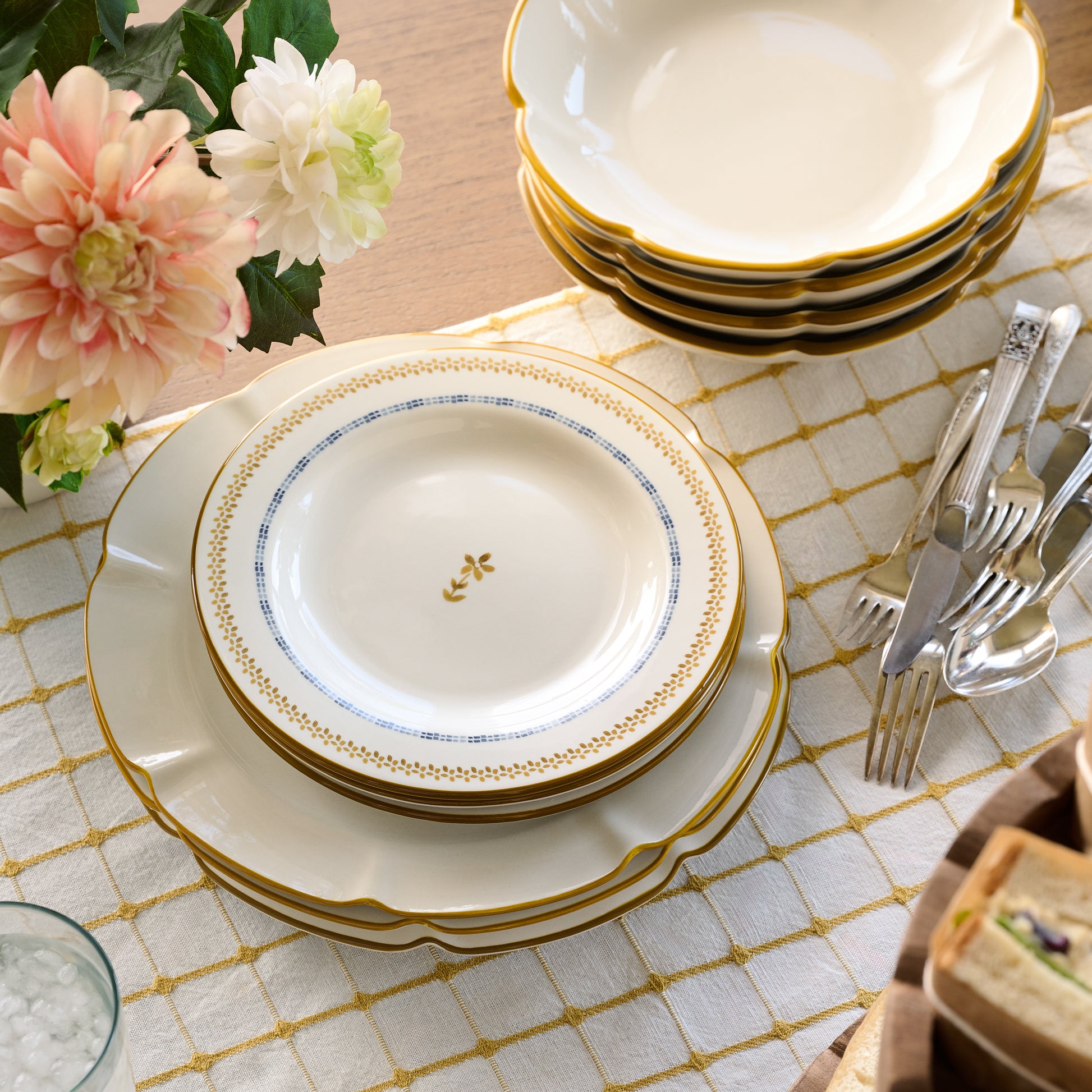 Luna Scalloped Plate stacked with luna salad plates