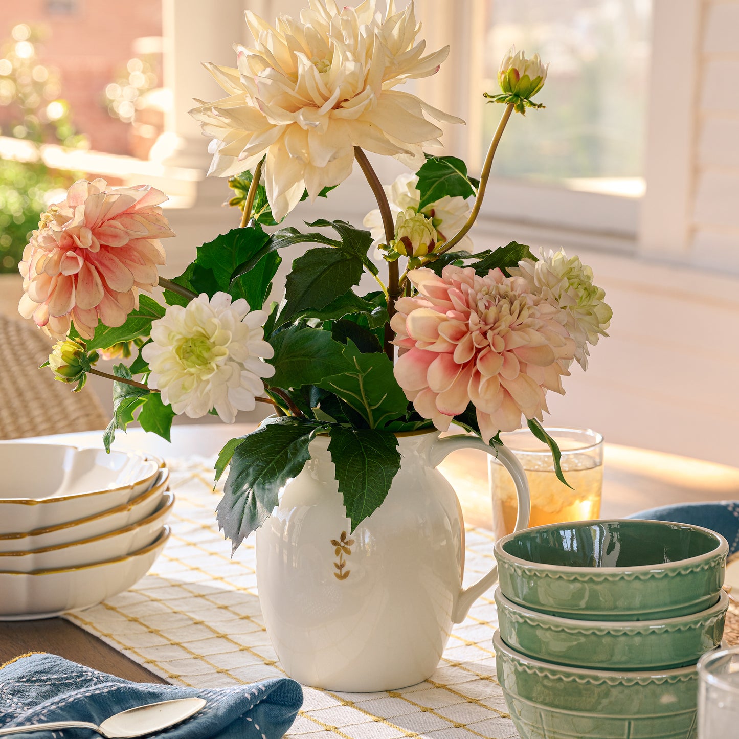 Luna Floral Pitcher on a table filled with florals