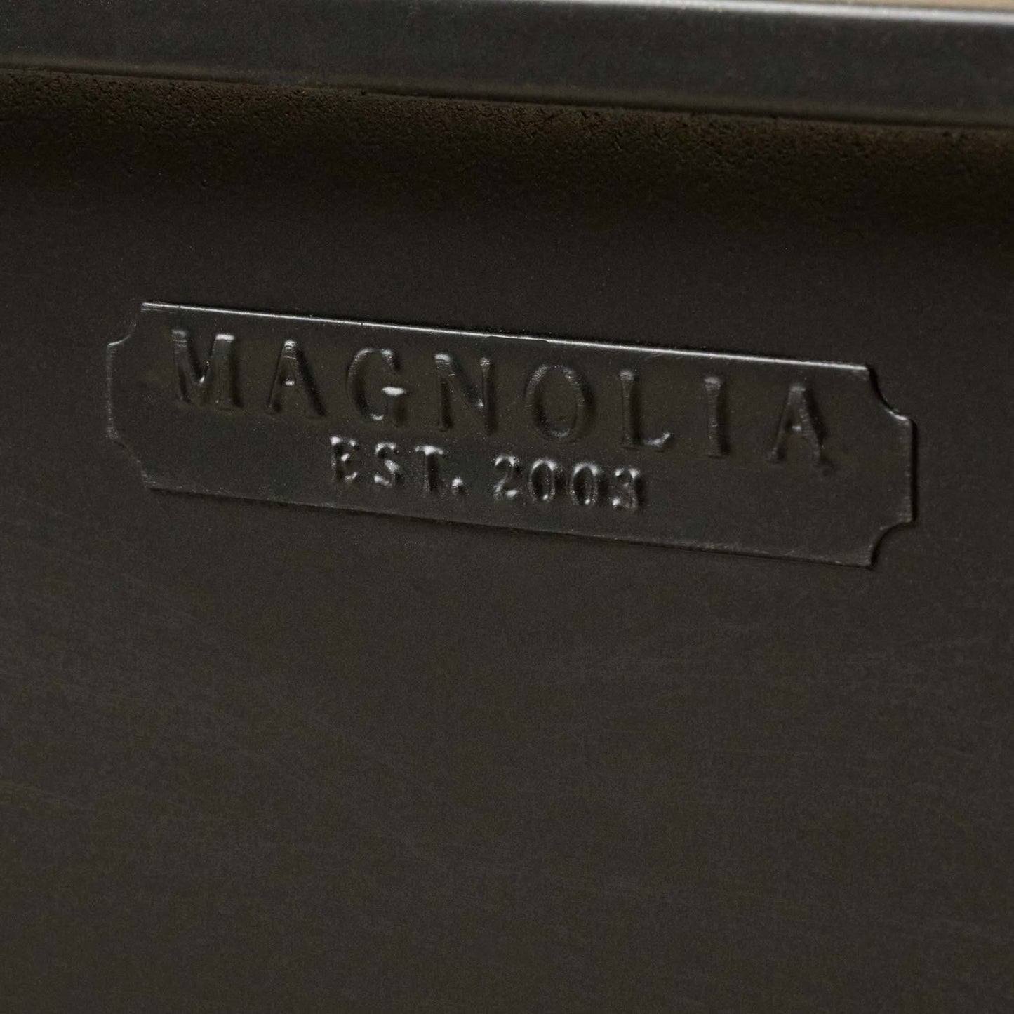 Archer Medicine Cabinet in black close up of magnolia logo