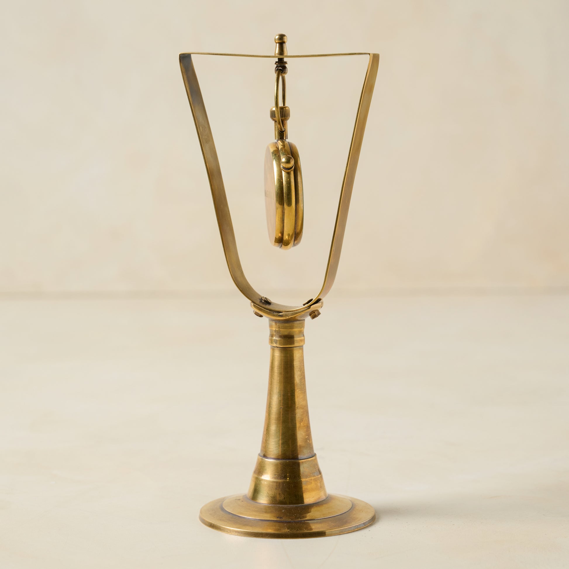 Antique Inspired Hanging Table Clock shows clock turned to the side