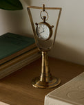Antique Inspired Hanging Table Clock on a shelf