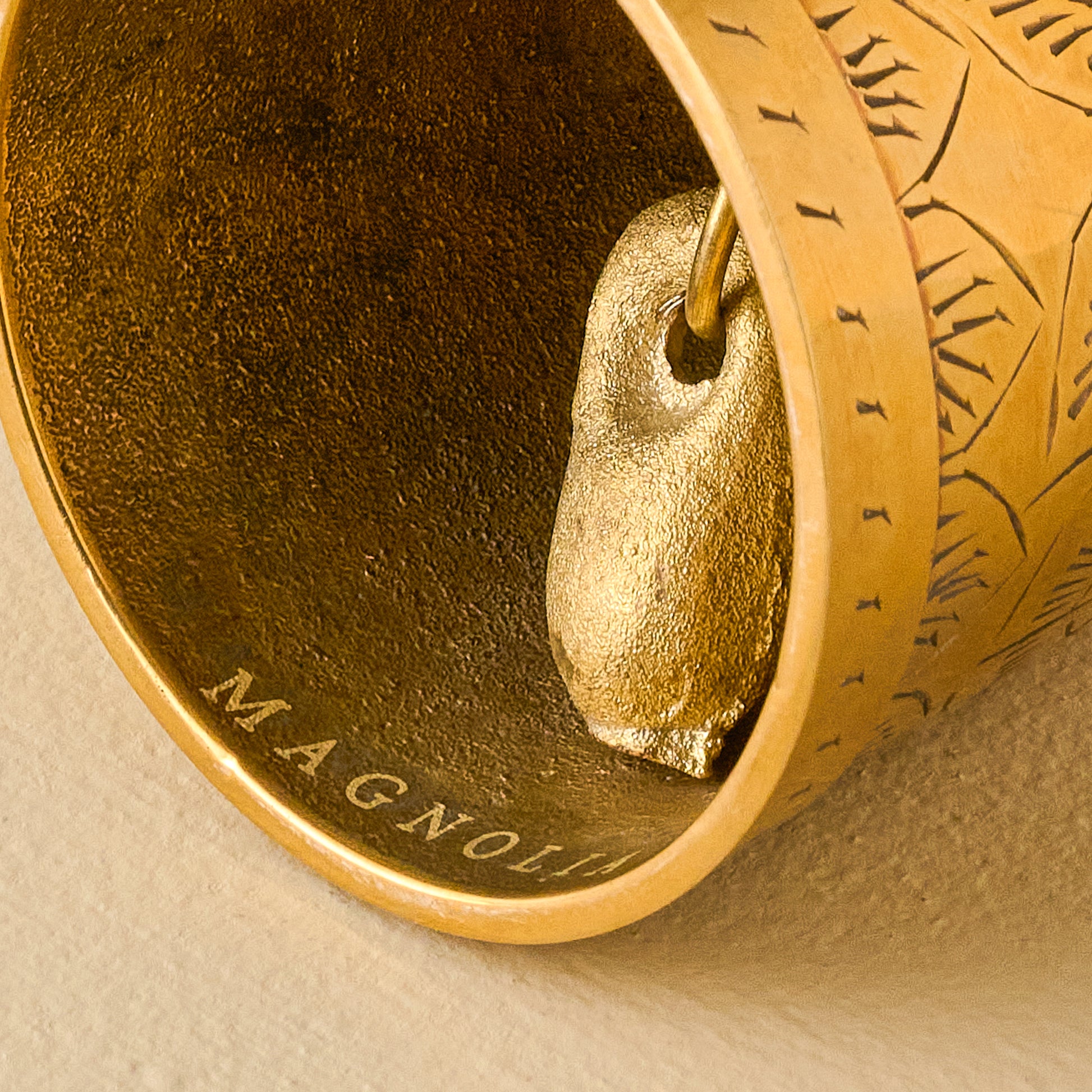 Gigi Etched Brass Bell close up of inside of bell