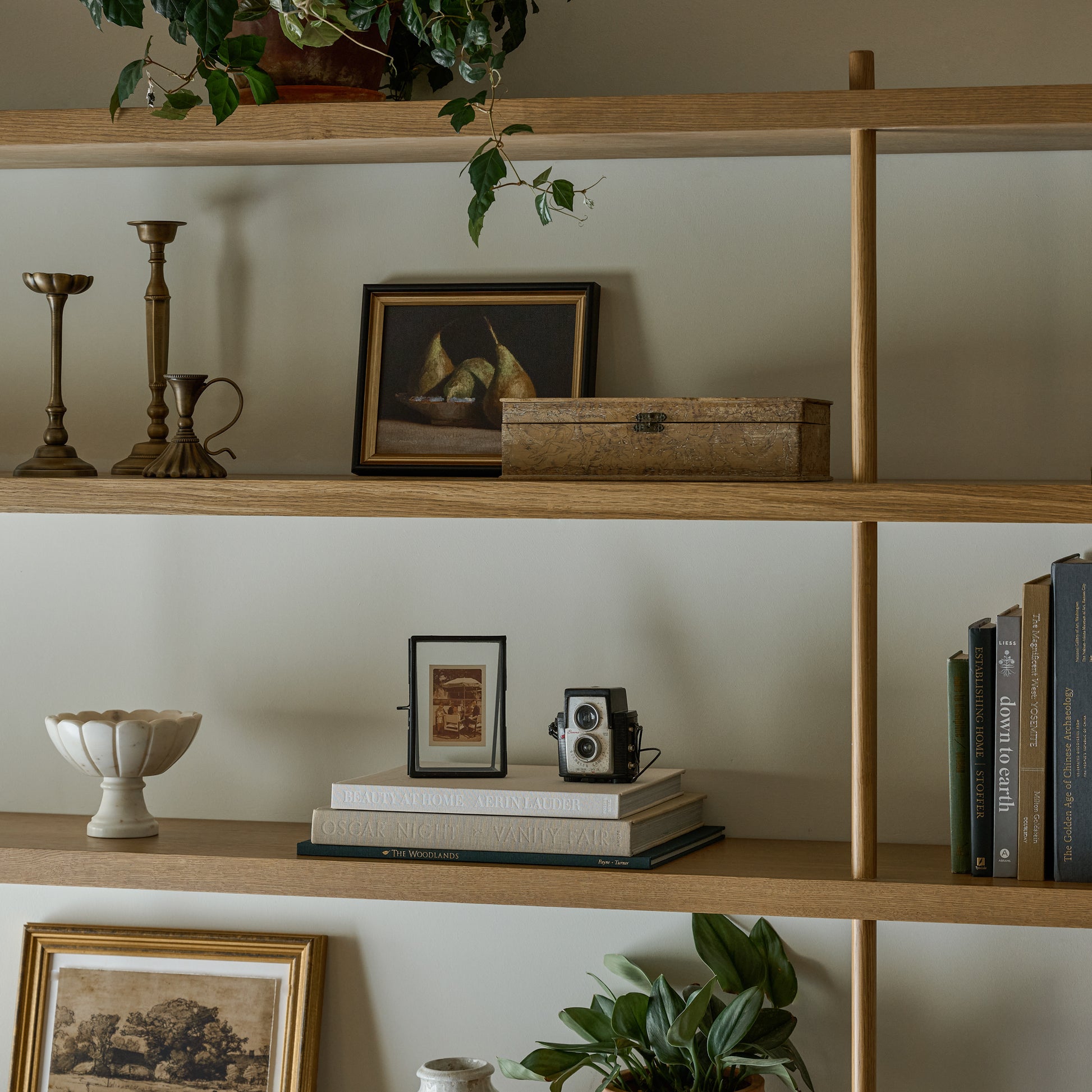Marble Scalloped Accent Bowl on open shelving with various decor