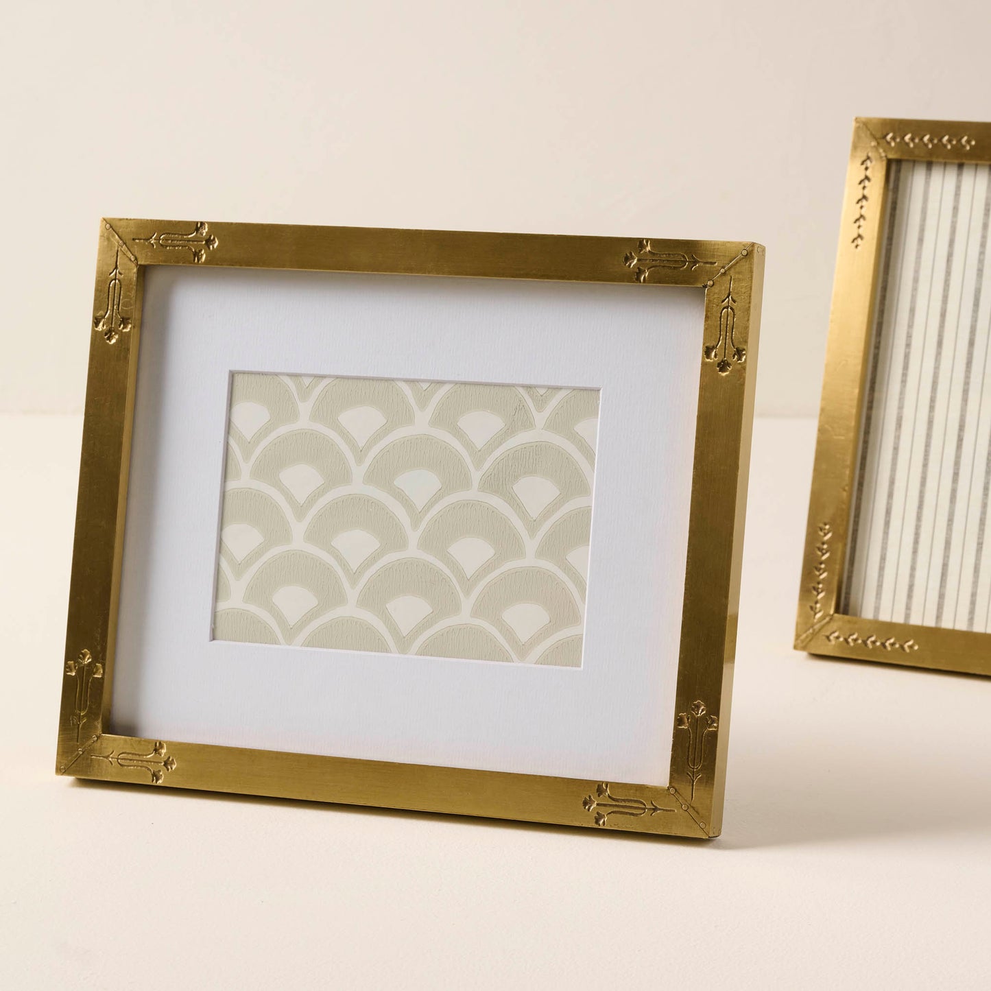 Floral Antique Brass Photo Frame shown sitting horizontally