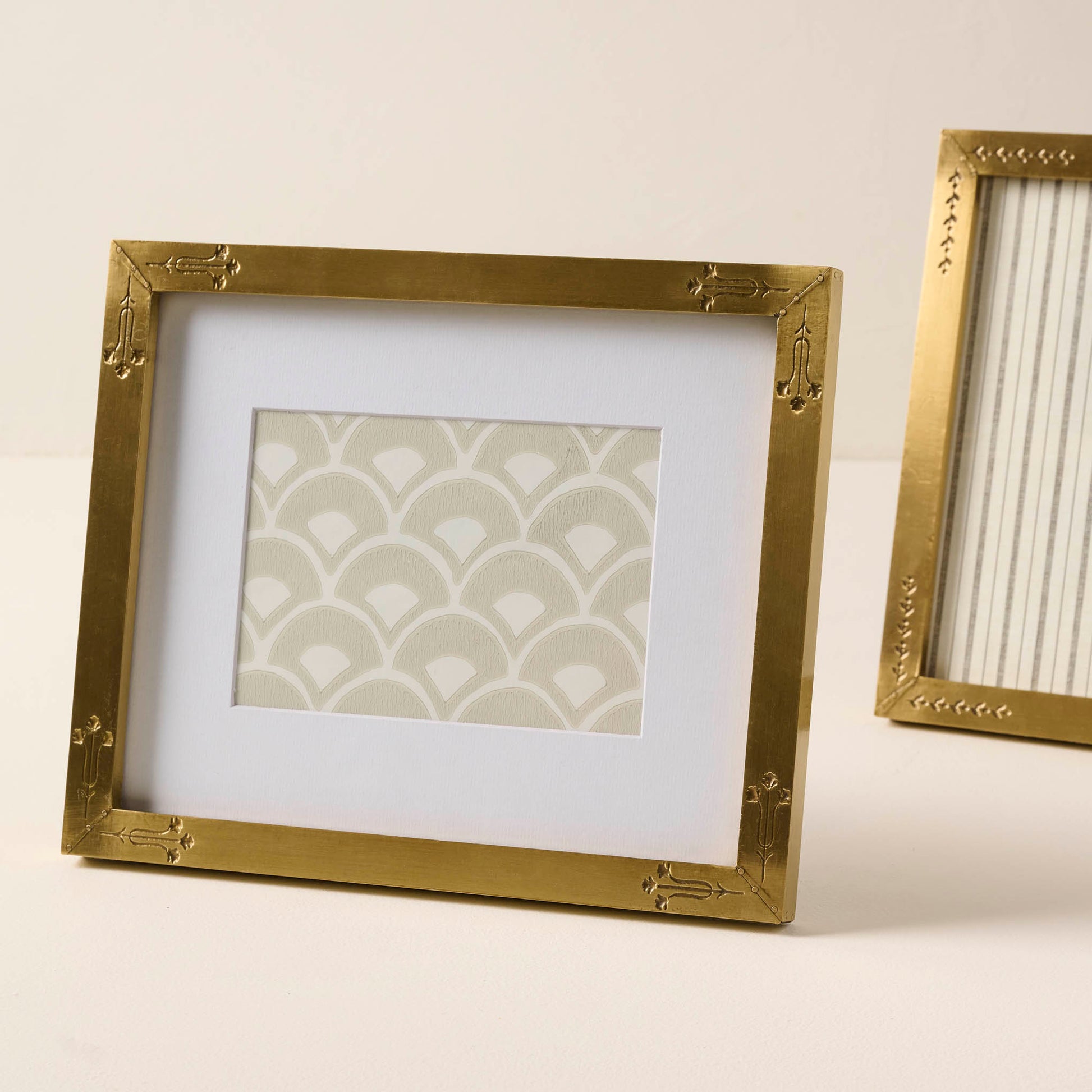 Floral Antique Brass Photo Frame shown sitting horizontally