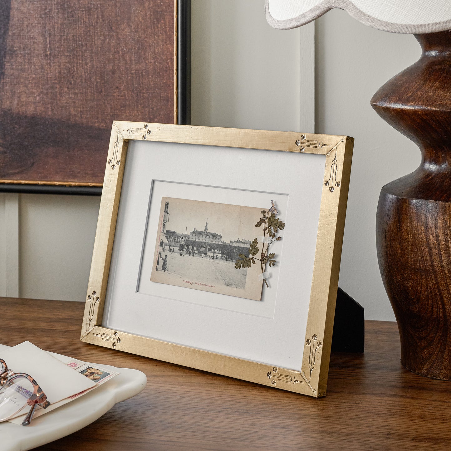 Floral Antique Brass Photo Frame shown on table