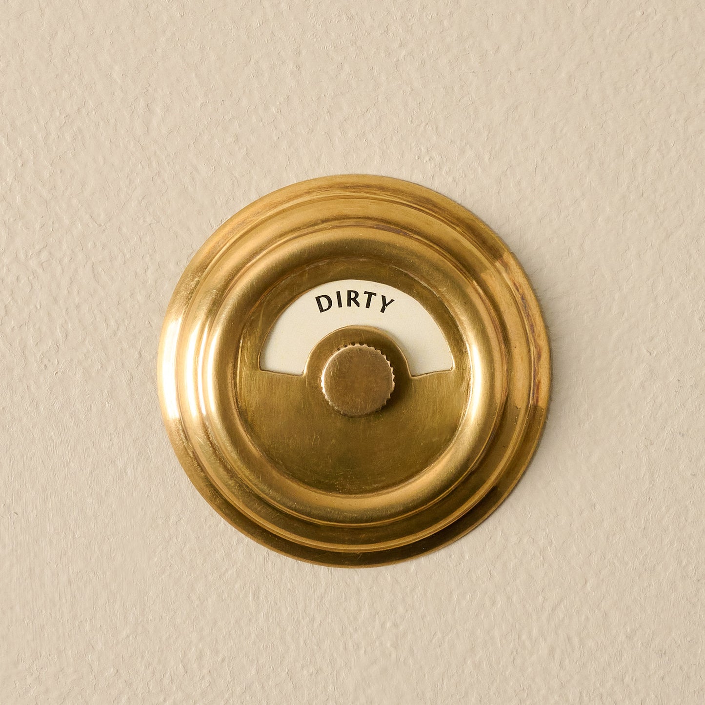 Antique Brass Dishwasher Marker showing "dirty"