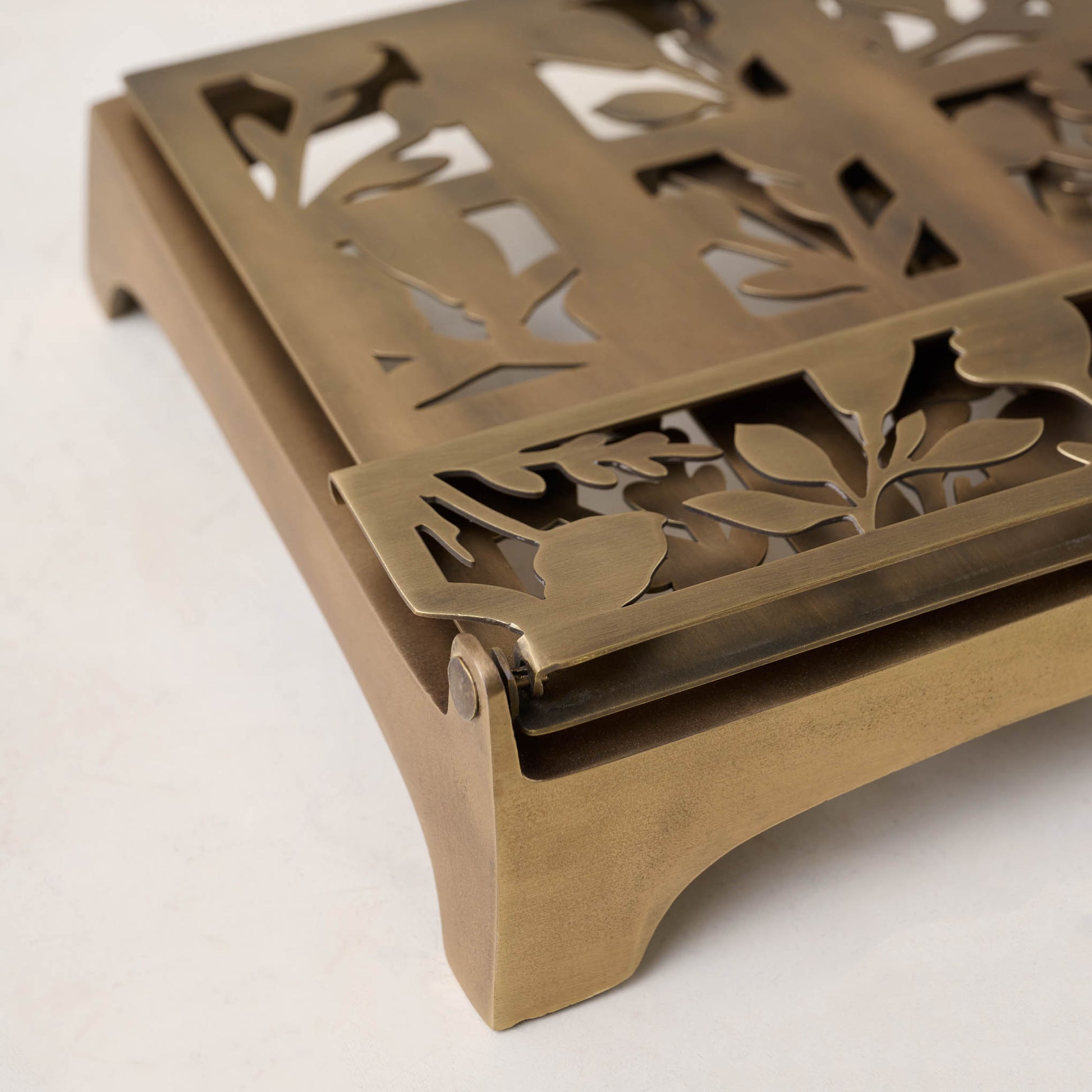 Antique Brass Shadow Floral Cookbook Stand close up of stand folded