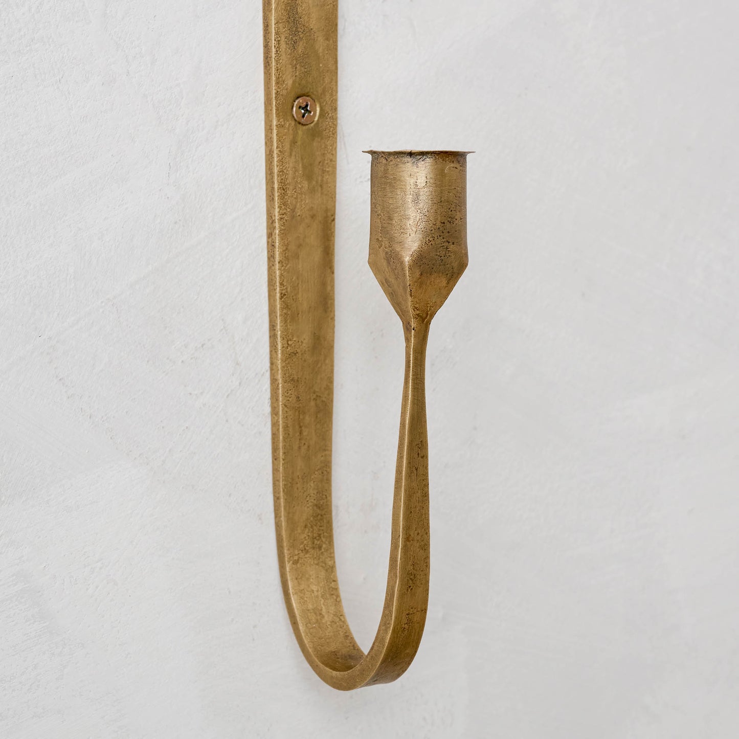 Julian Forged Iron Wall Sconce in antique brass close up
