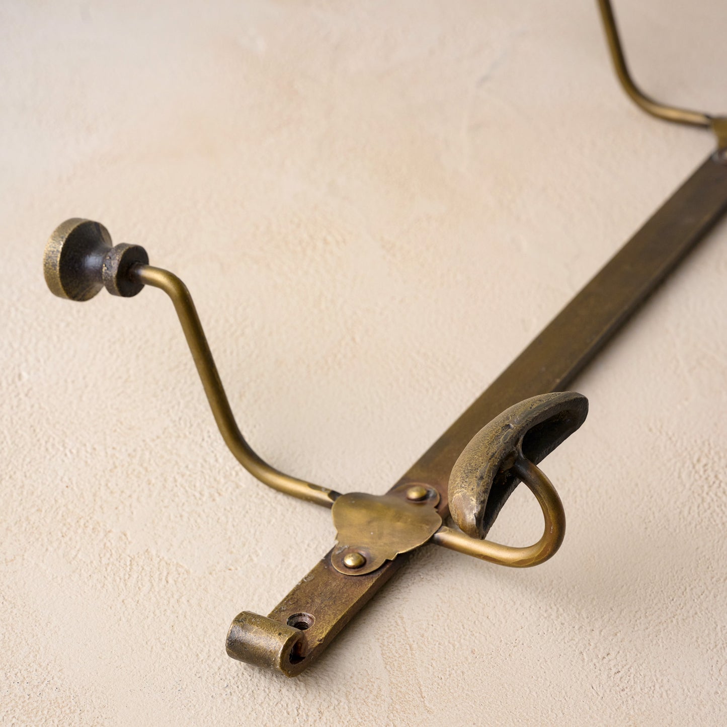 Duke Antique Brass Metal Wall Hooks close up of hook