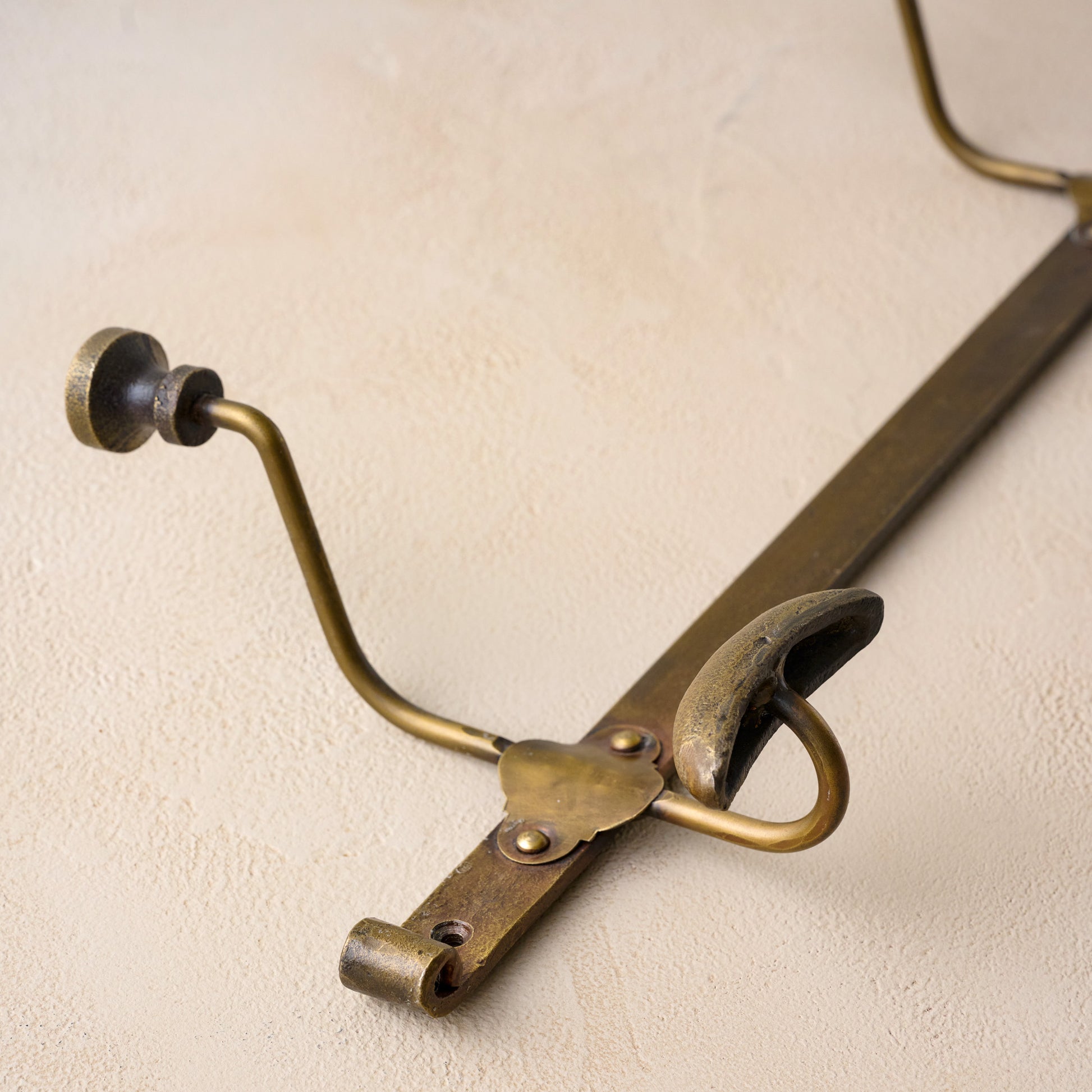 Duke Antique Brass Metal Wall Hooks close up of hook