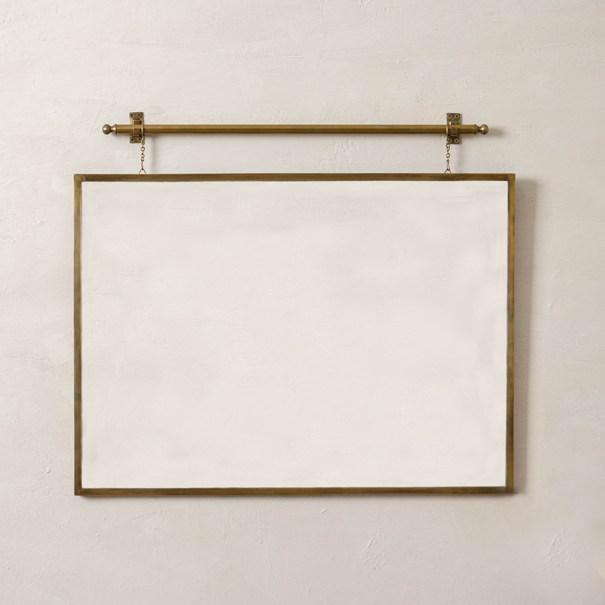 Colleen Brass Rail Wall Mirror hanging horizontally