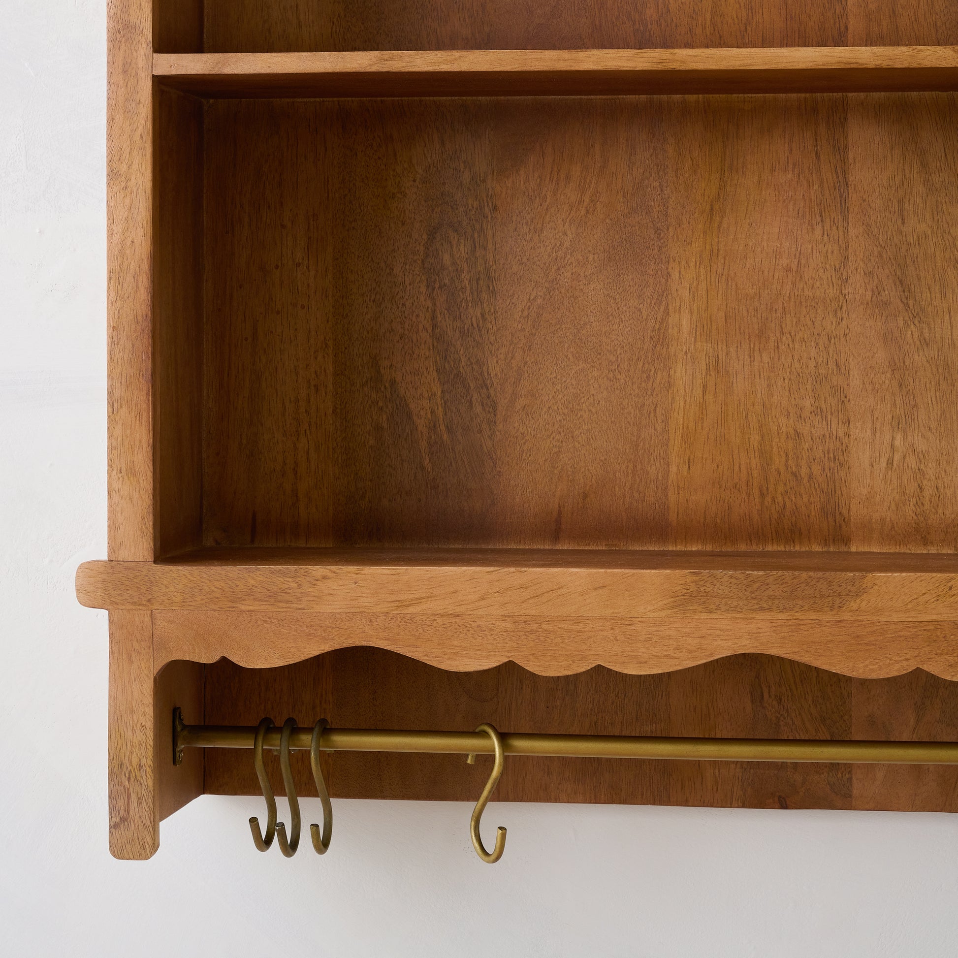 Daphne Wooden Wall Shelf close up of hooks on bottom of shelf