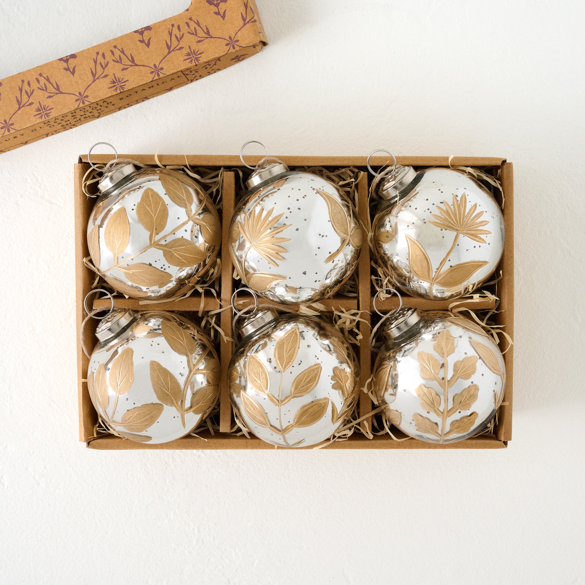 Small Mercury Glass and Gold Botanical Ornament Set of Six shown in box