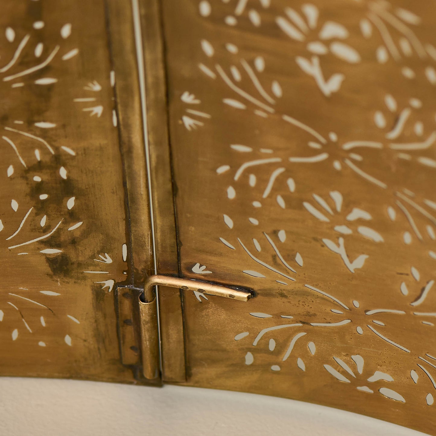 Antique Brass Finish Tree Collar close up of latch on tree collar