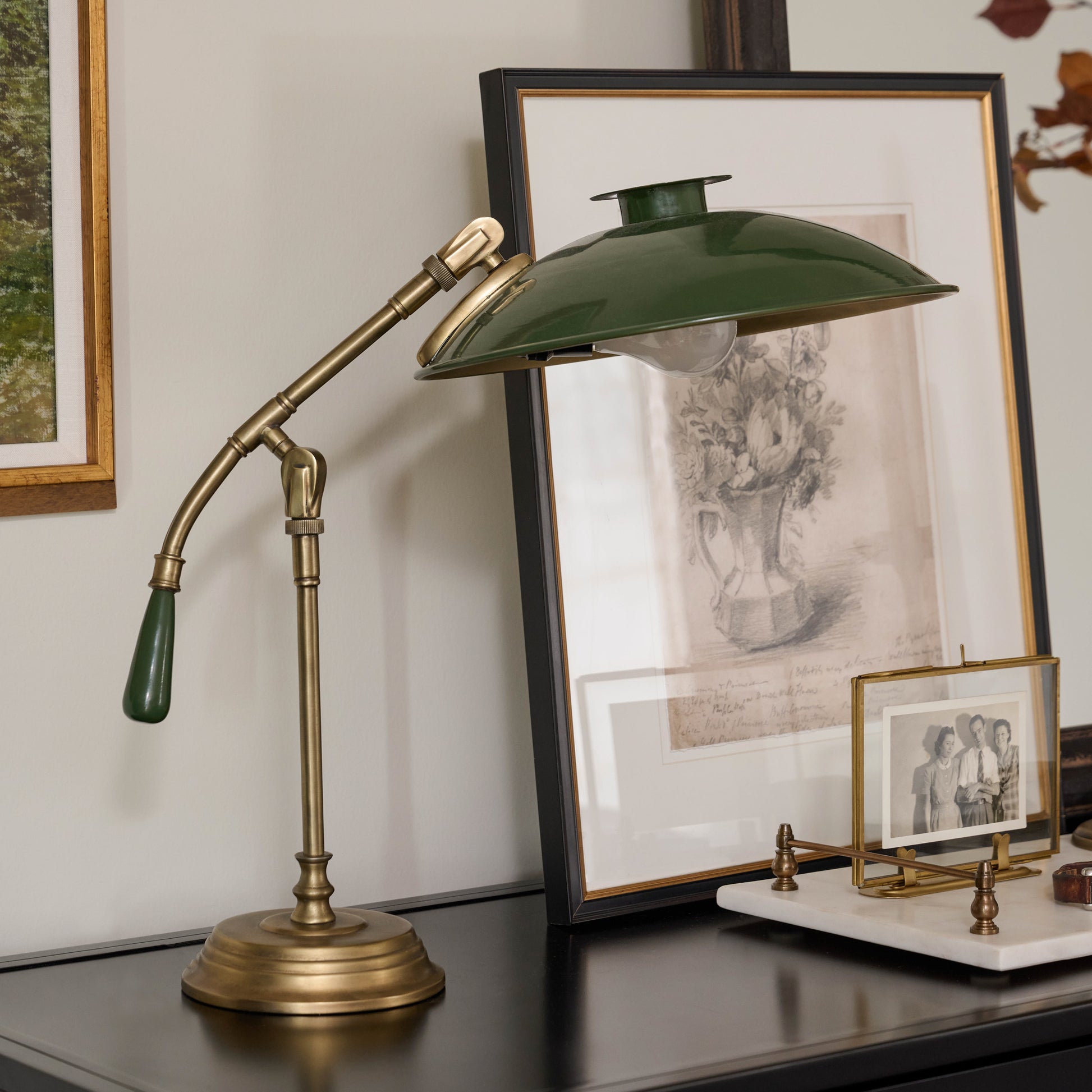 Vintage Floral Sketch I on a dresser next to a lamp
