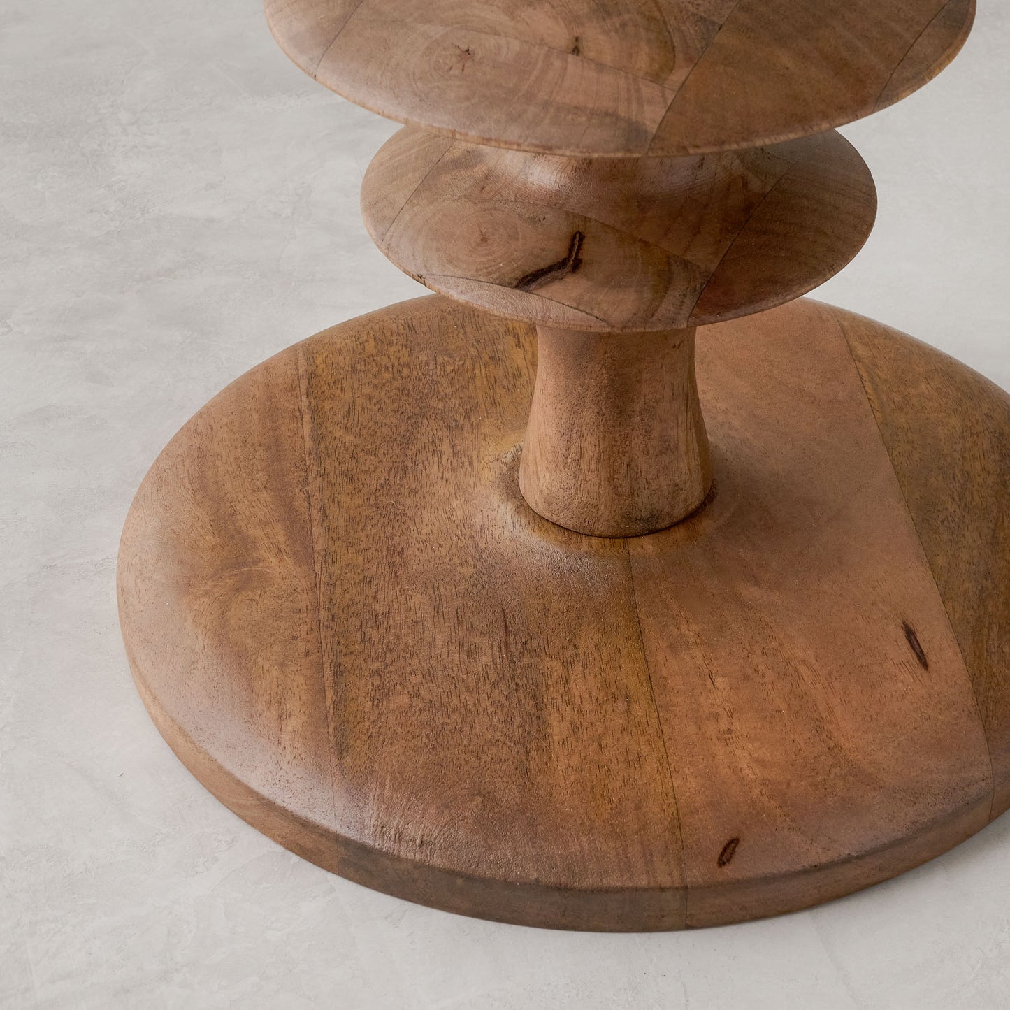 Enzo Turned Wood Side Table in color honey Mango close up of base of table