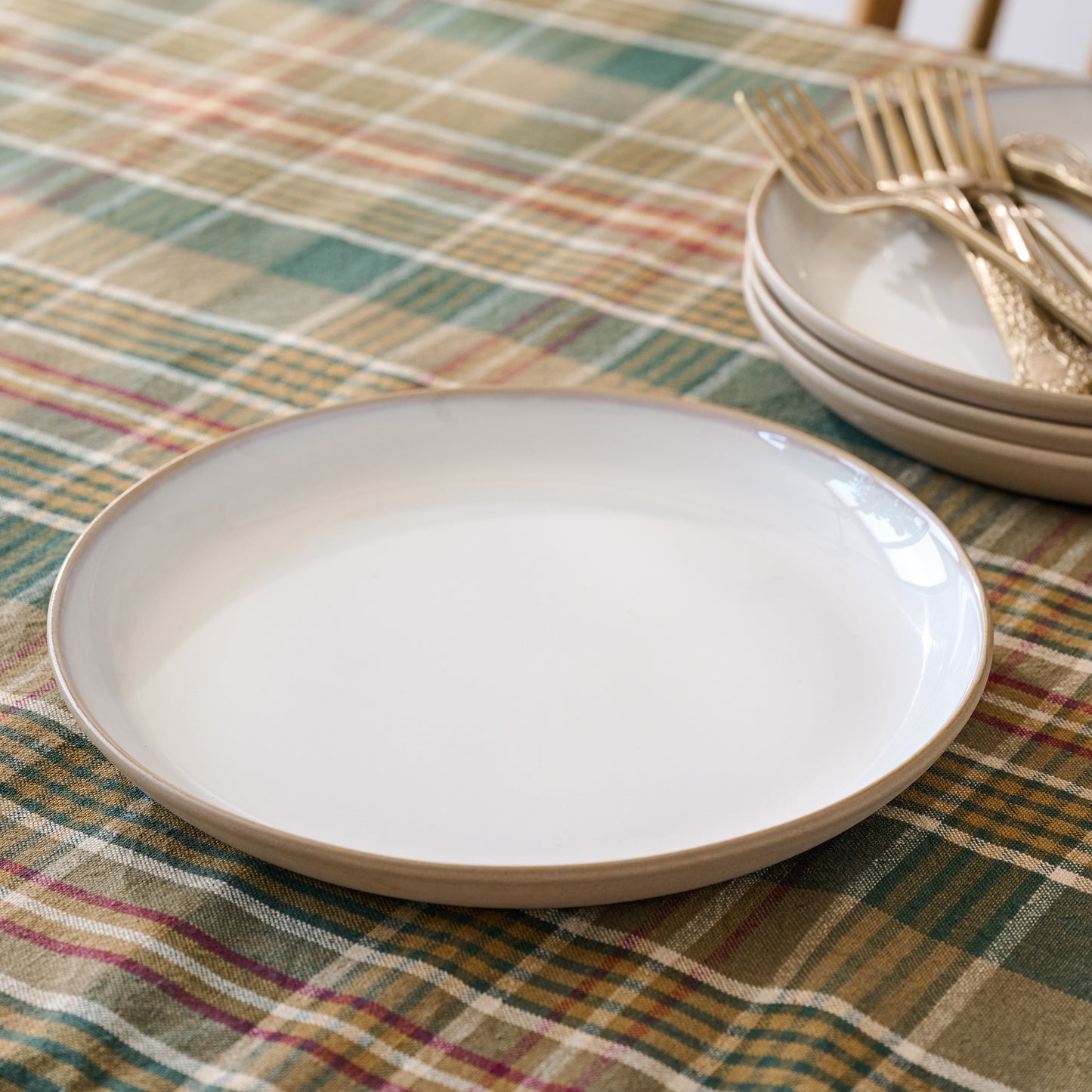 Stone White Lakelynn Plate on a winter plaid table cloth