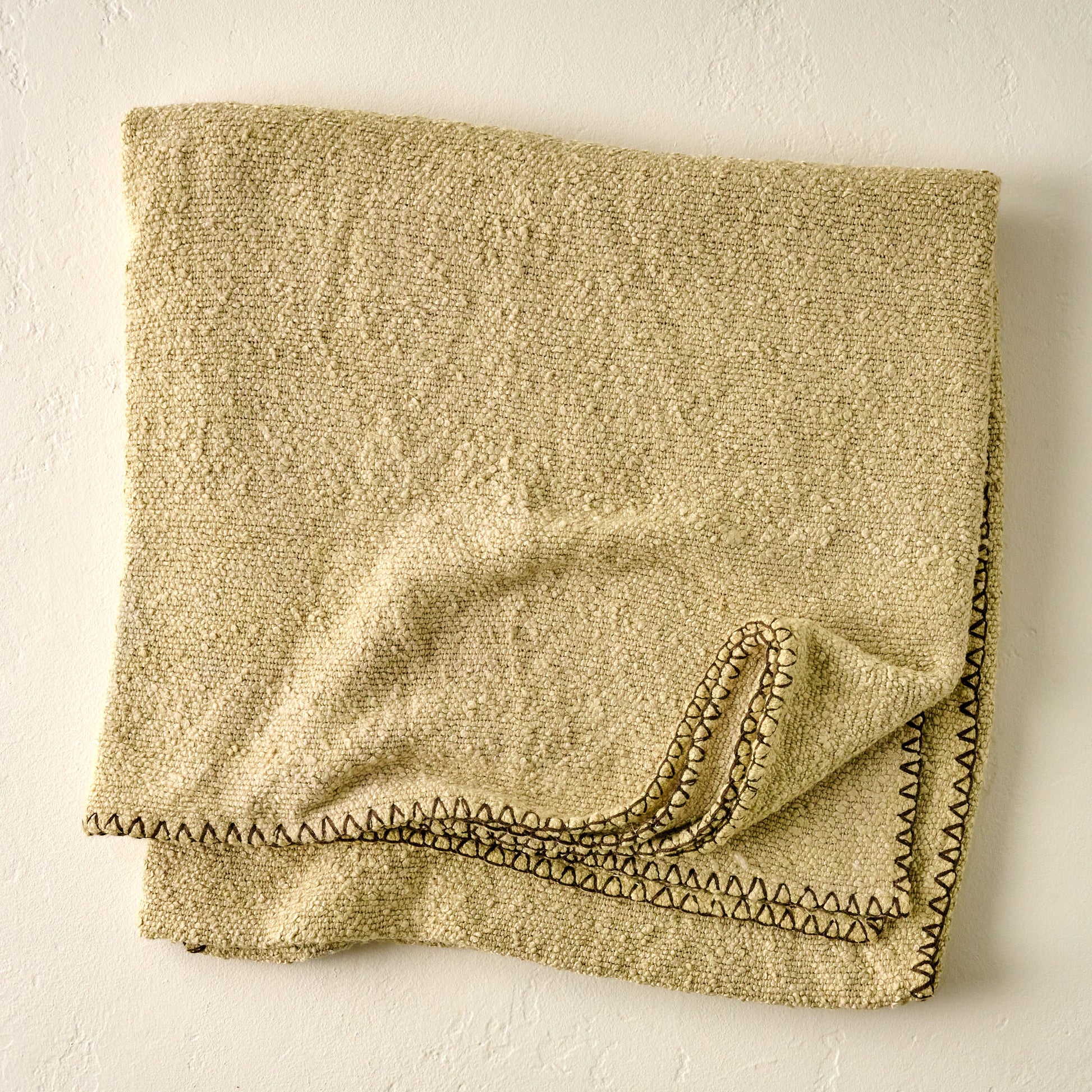 Light Tan Remie Oversized Boucle Throw folded