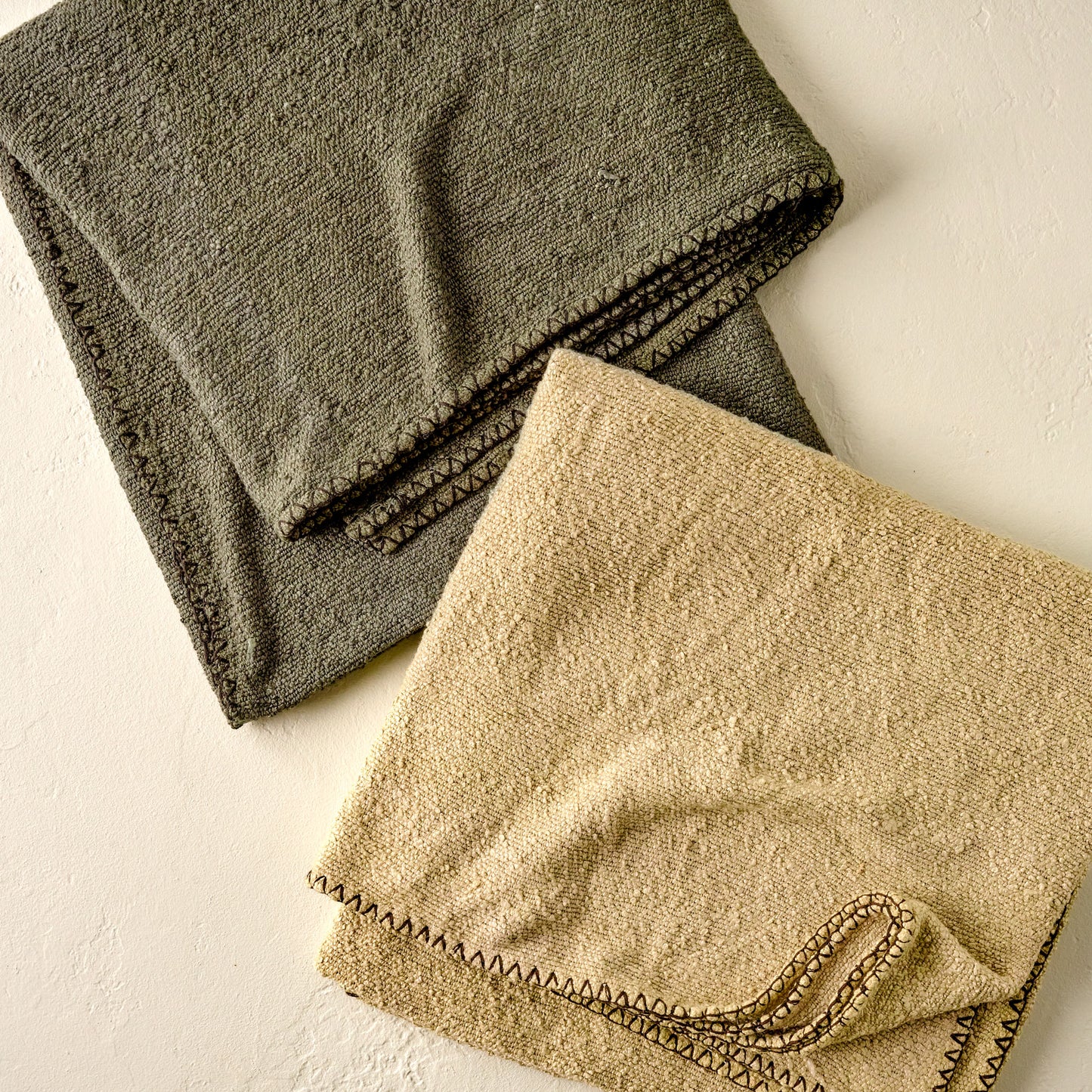 Green and Light Tan Remie Oversized Boucle Throws folded