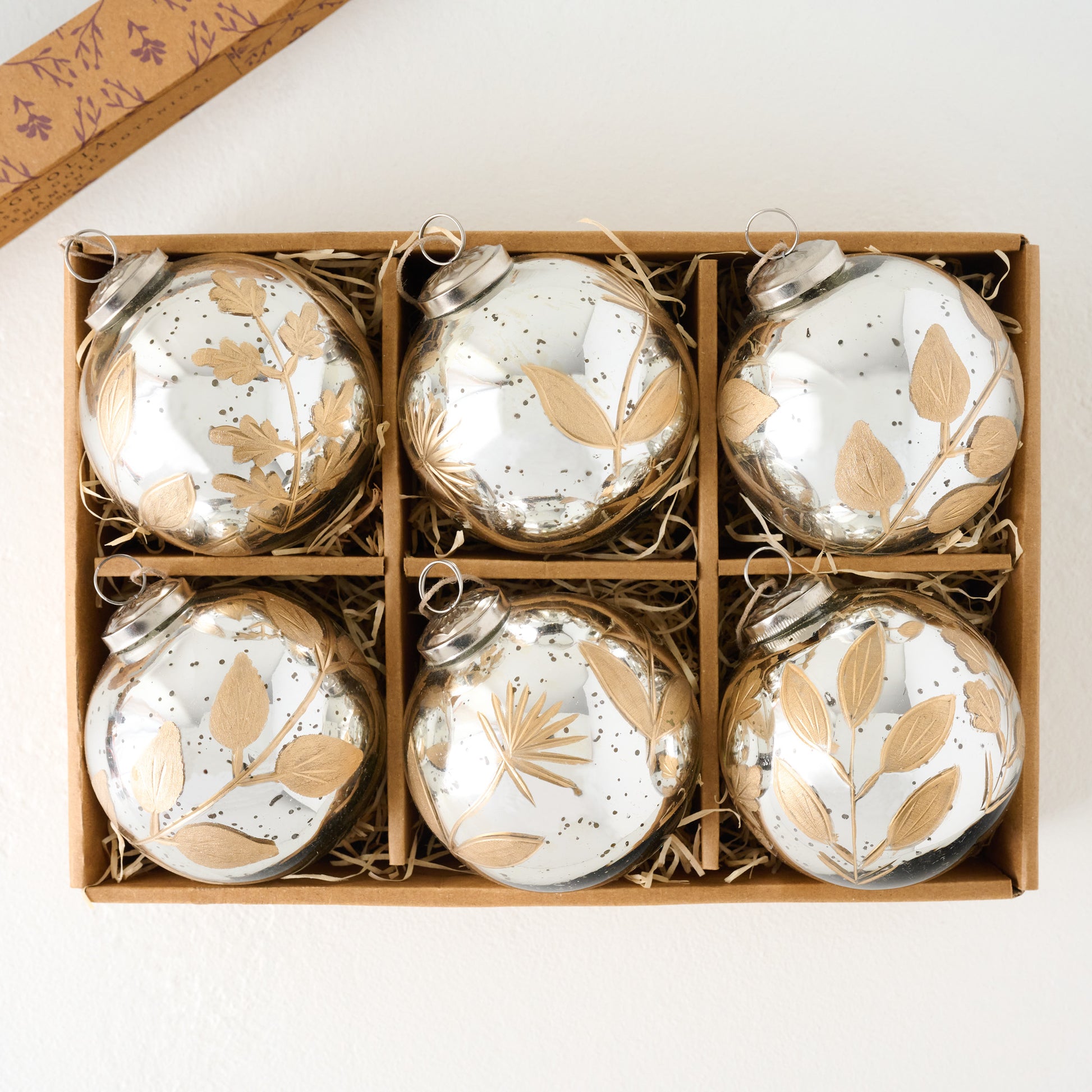 Large Mercury Glass and Gold Botanical Ornament Set of Six shown in box