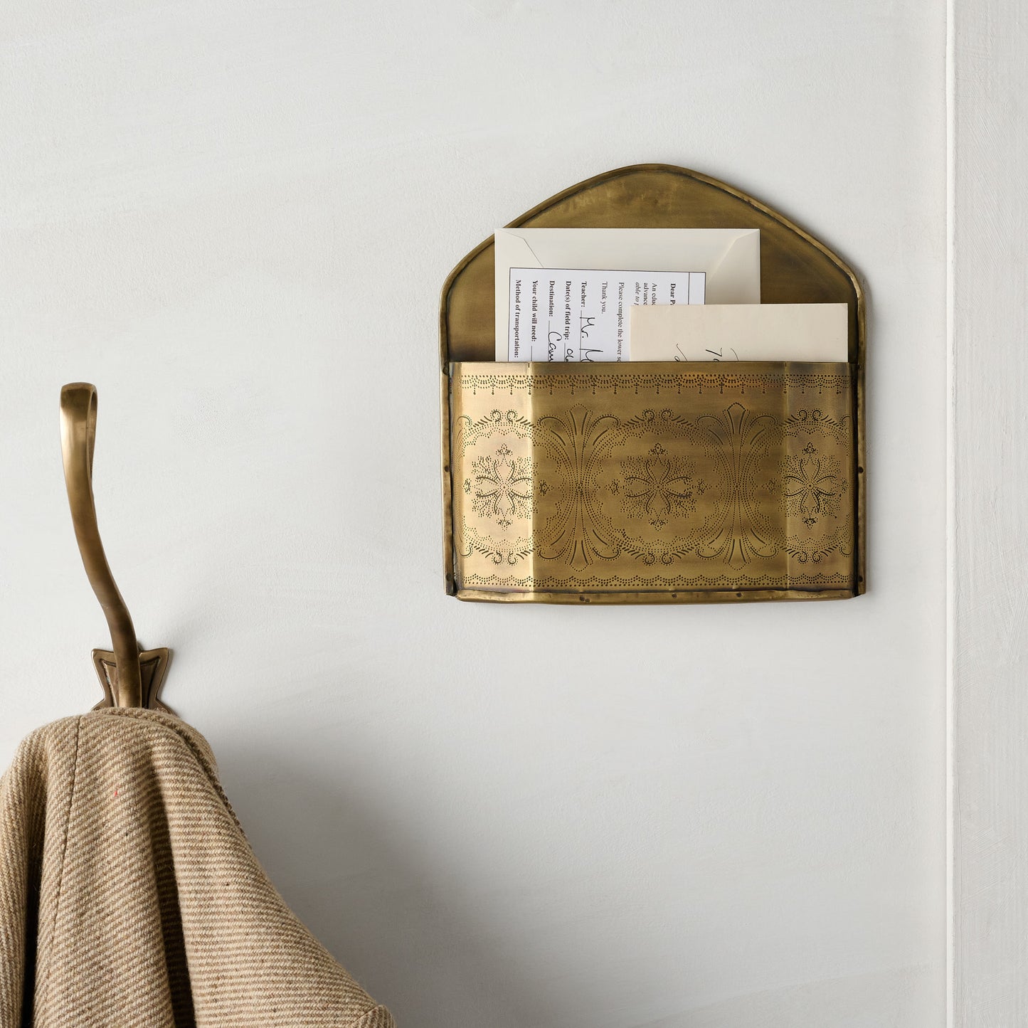 Etched Brass Wall Card Holder shown holding mail