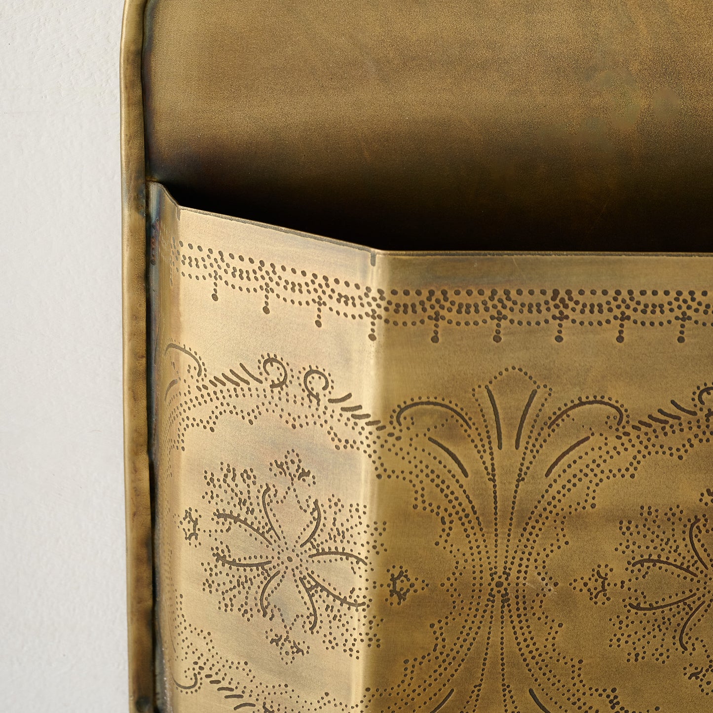 Etched Brass Wall Card Holder up close