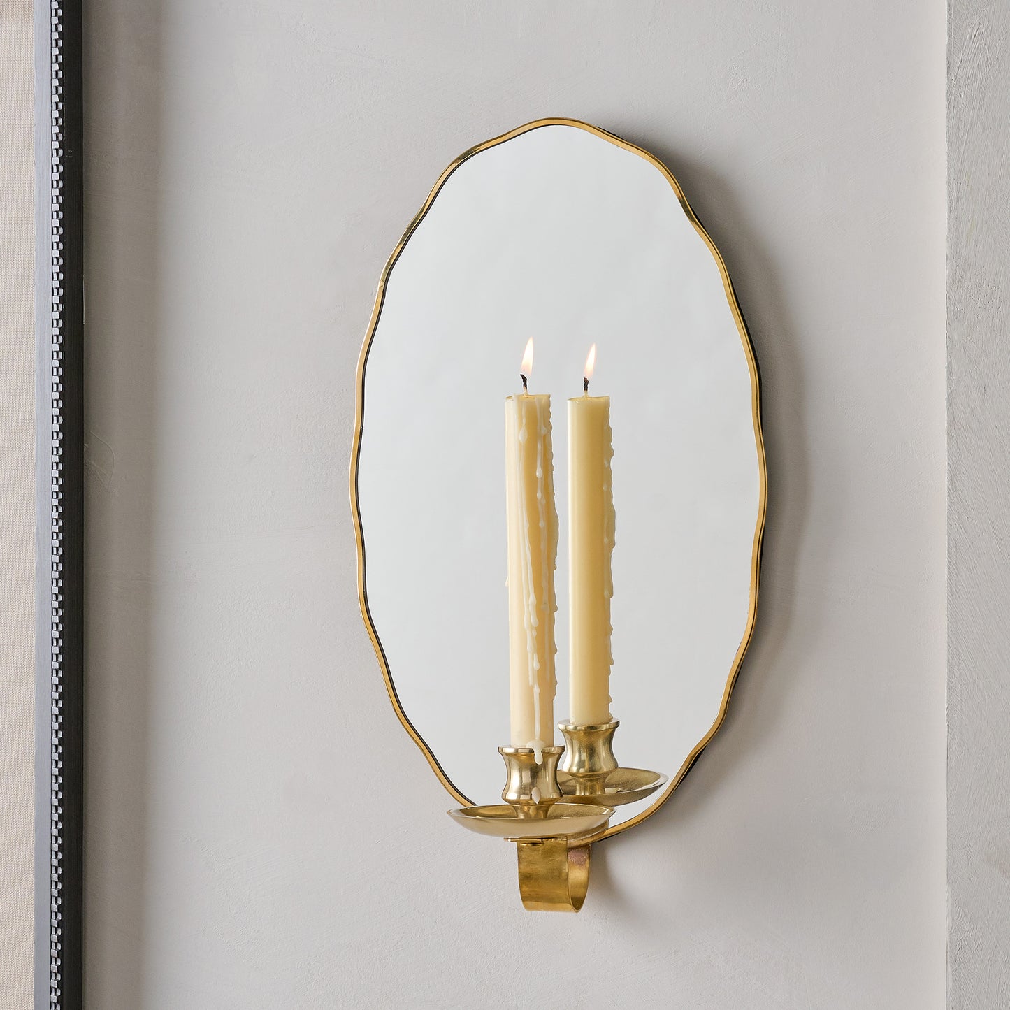Clara Scalloped Mirrored Wall Sconce shown with mirror
