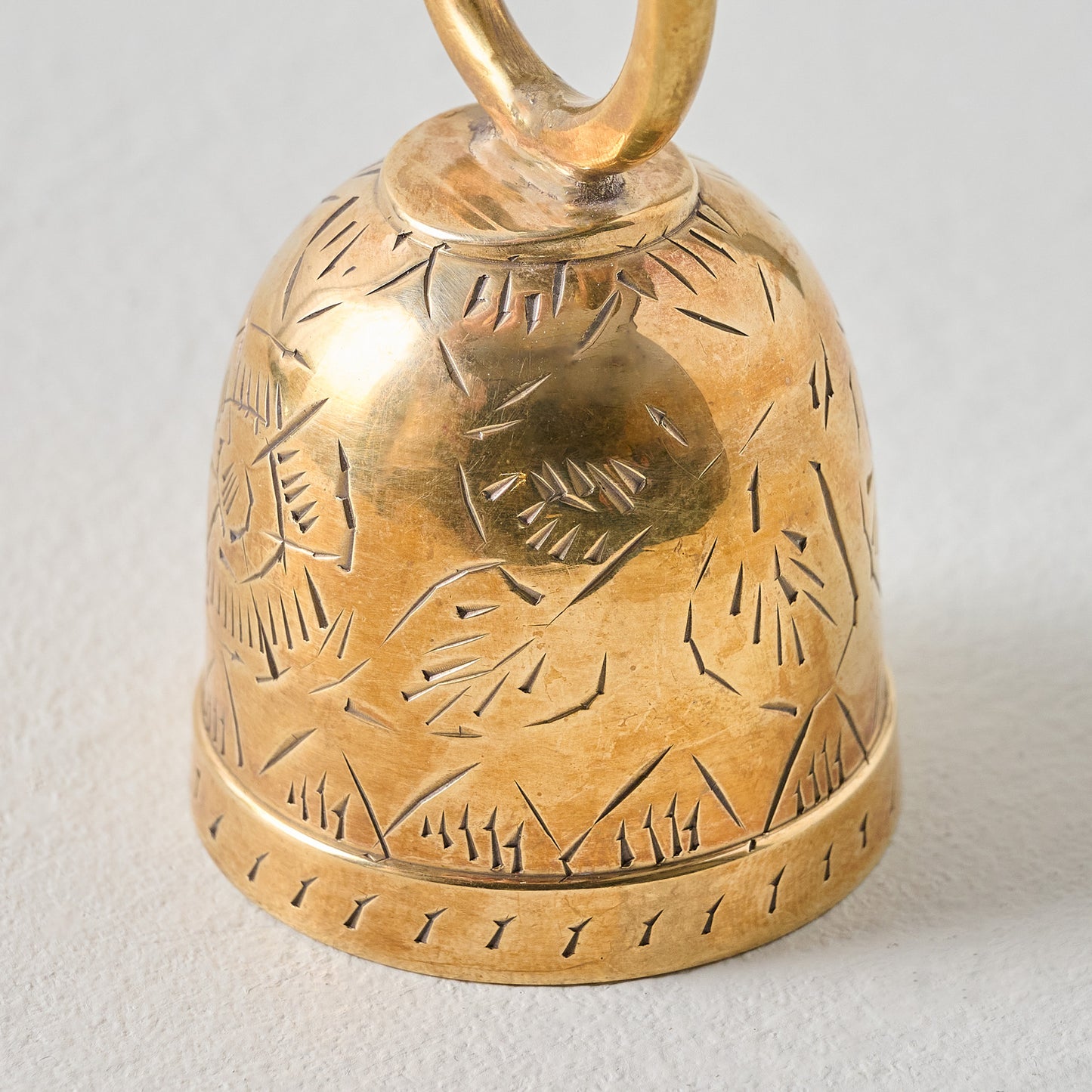 Gigi Etched Brass Bell Ornament up close