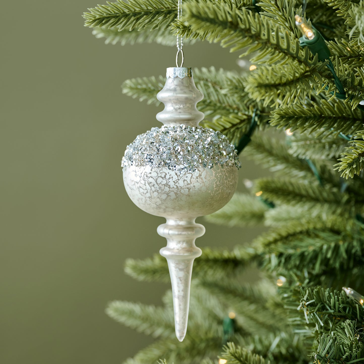 Winter Splendor Finial Ornament shown on tree