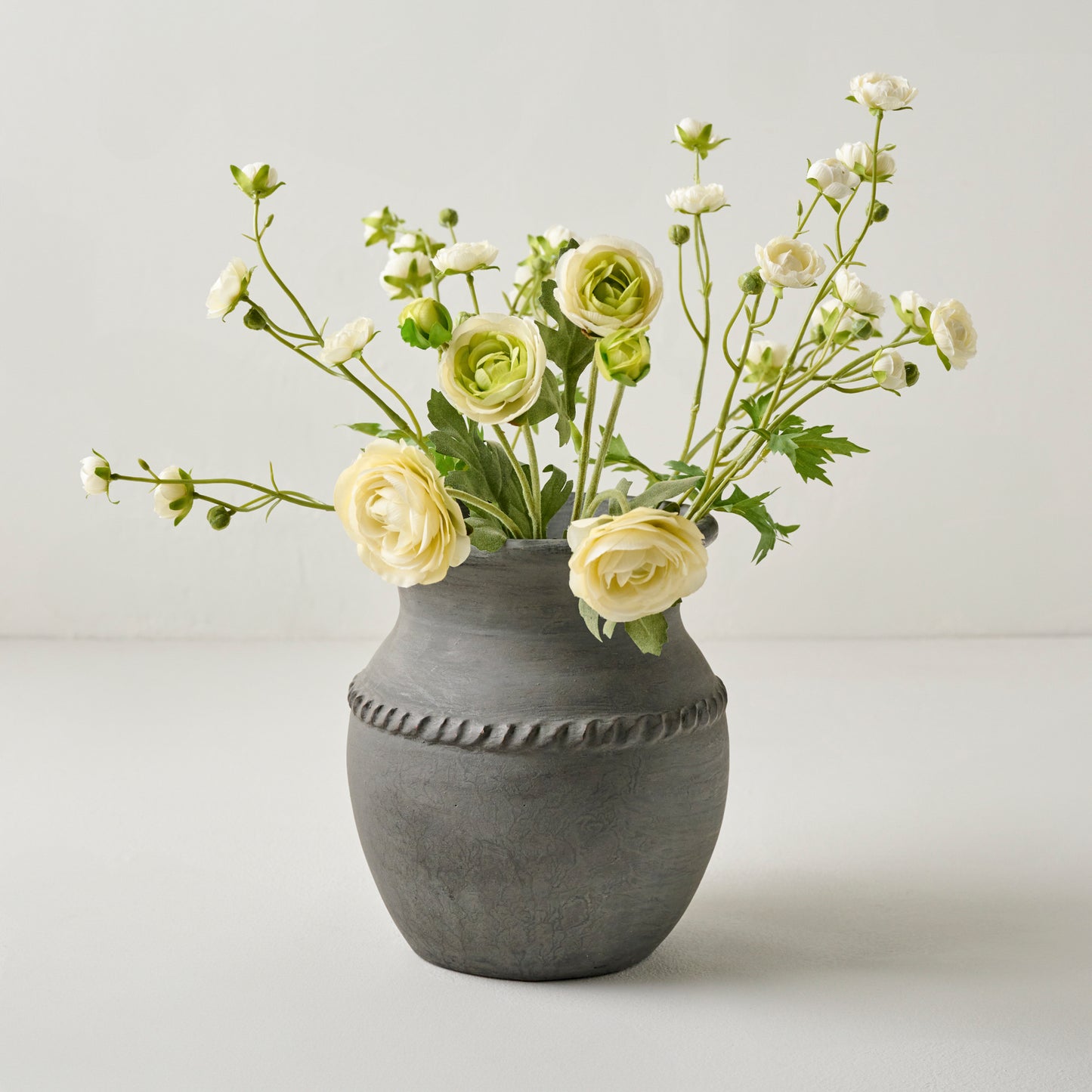Camila Black Terracotta Vase shown with florals